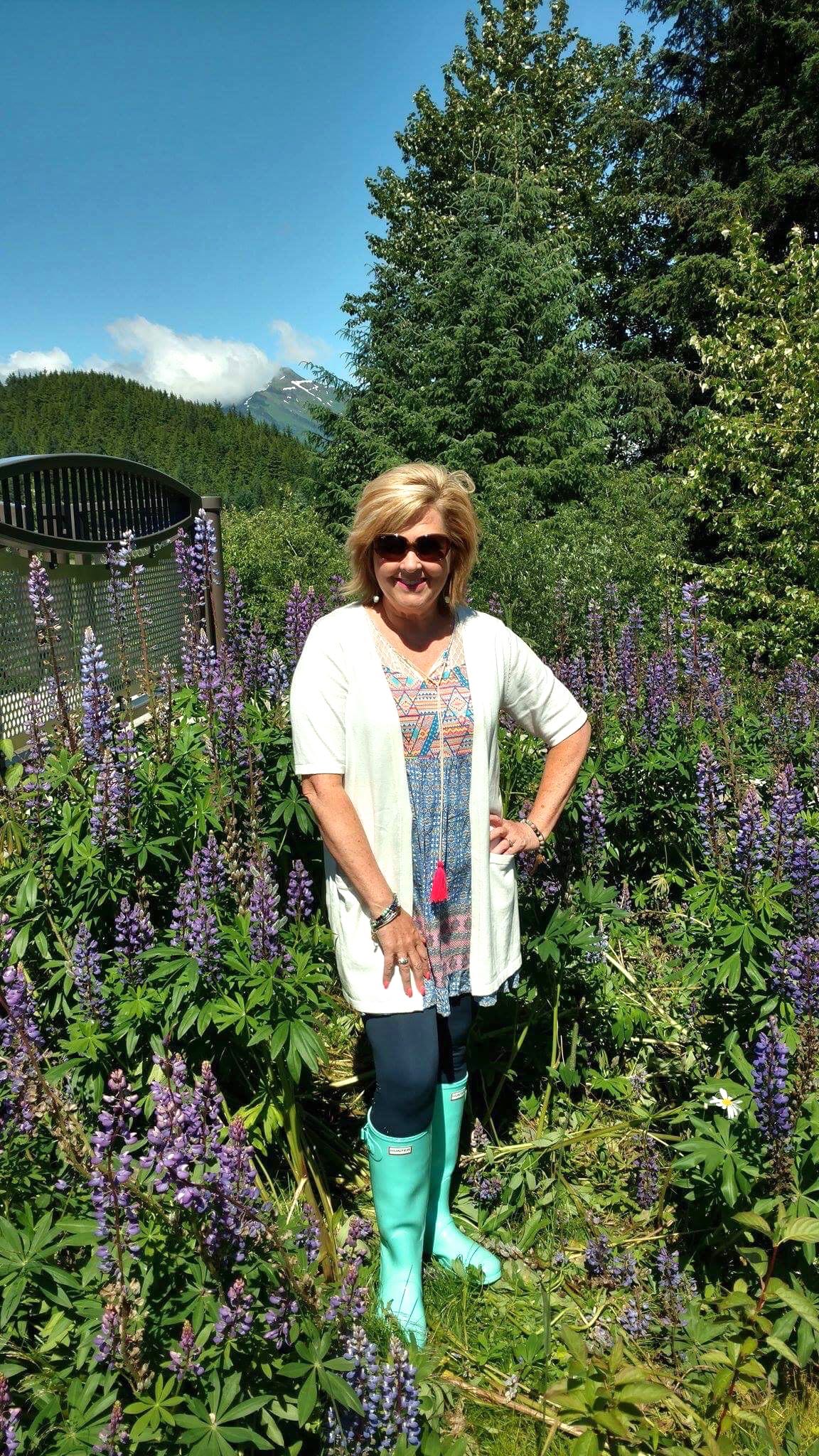 50 IS NOT OLD | STANDING IN A FIELD OF LUPINE