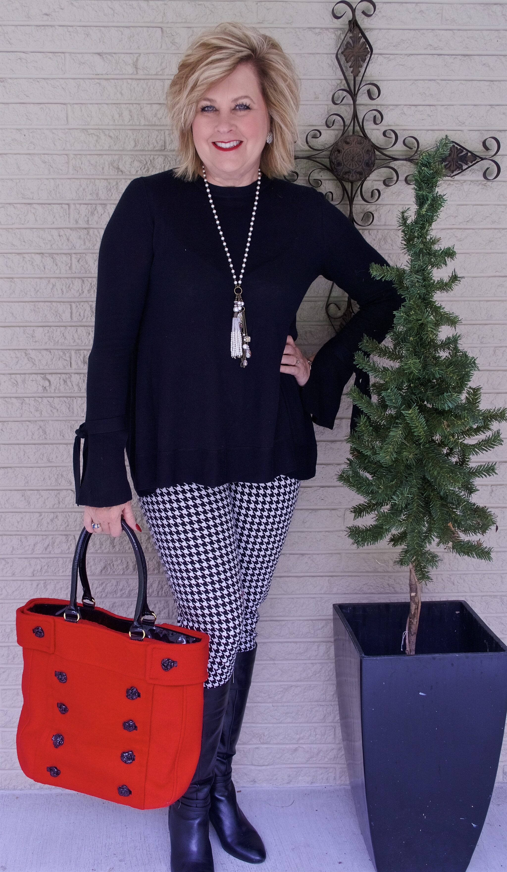 50 IS NOT OLD | WEARING A BELL SLEEVE SWEATER