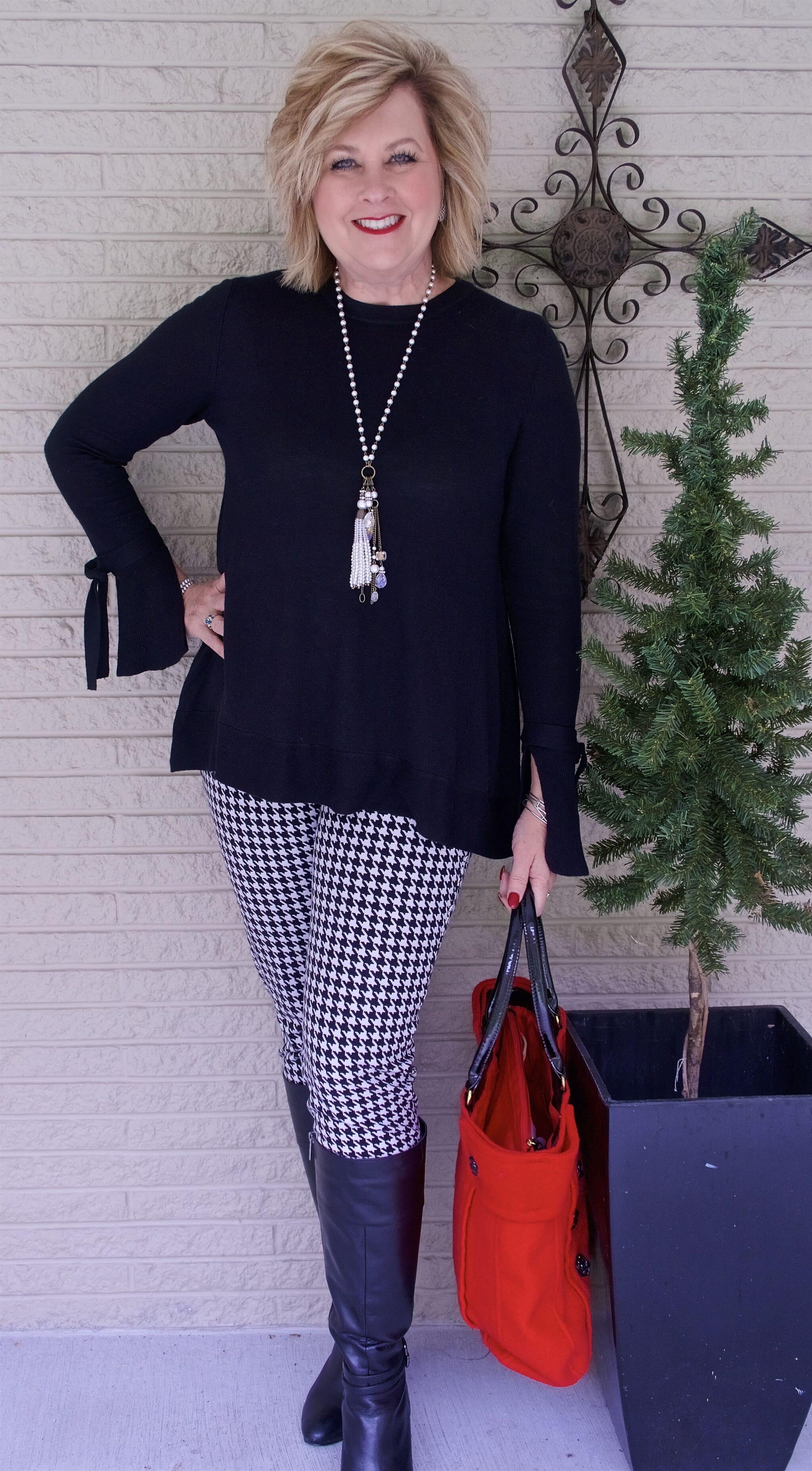 50 IS NOT OLD | WEARING A BELL SLEEVE SWEATER