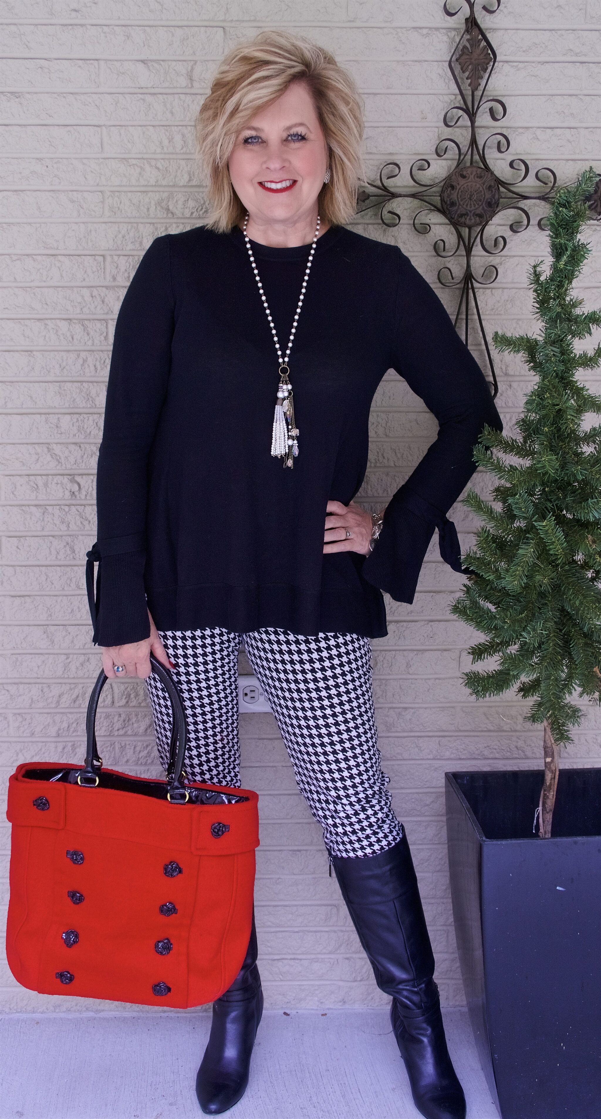50 IS NOT OLD | WEARING A BELL SLEEVE SWEATER