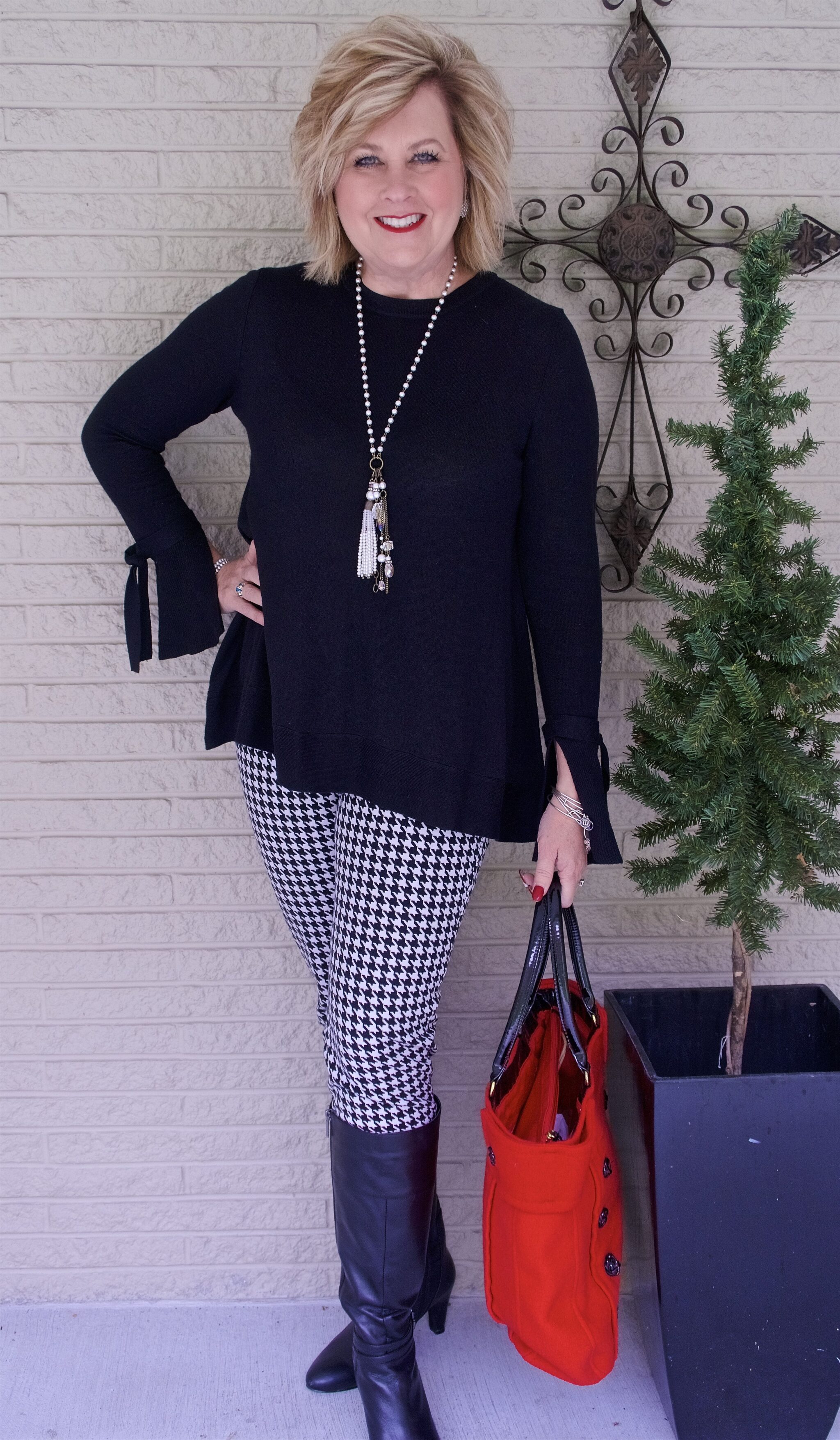 50 IS NOT OLD | WEARING A BELL SLEEVE SWEATER