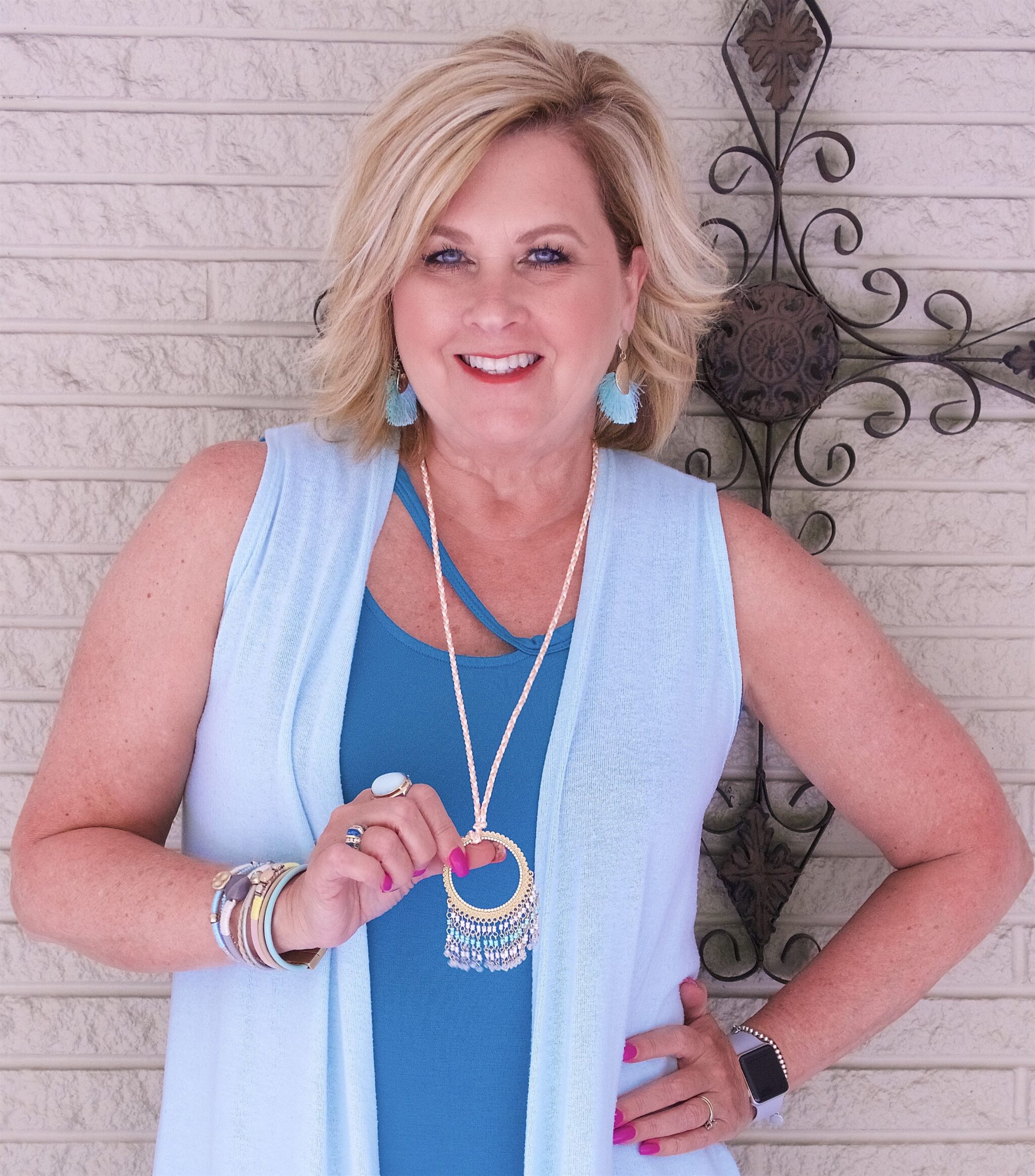 A MAXI DRESS AND A LONG VEST