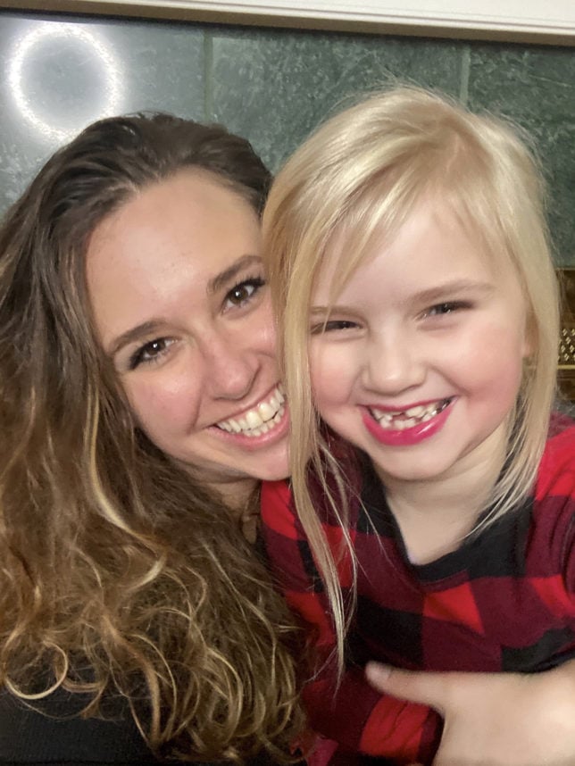 two smiling girls in pajamas