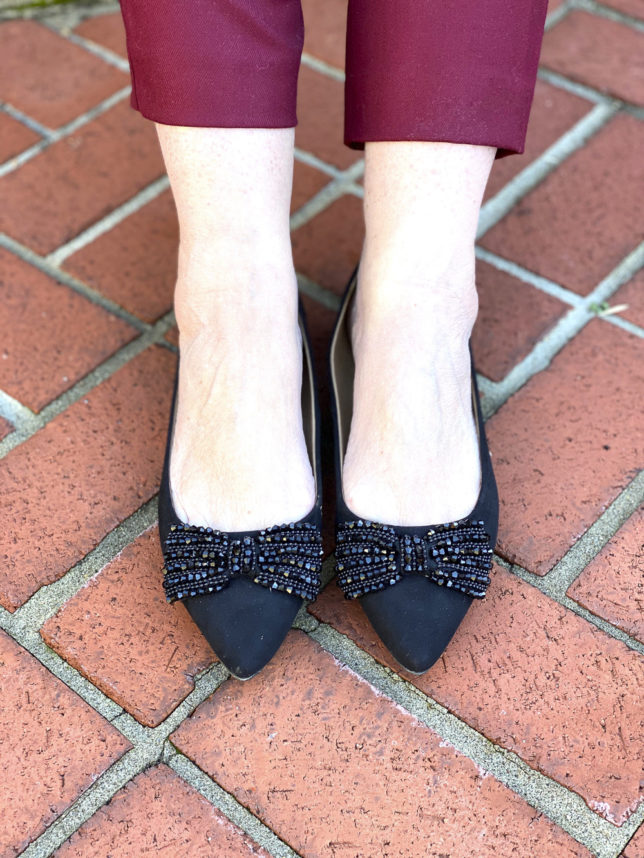 black jeweled flats worn by Fashion Blogger 50 Is Not Old