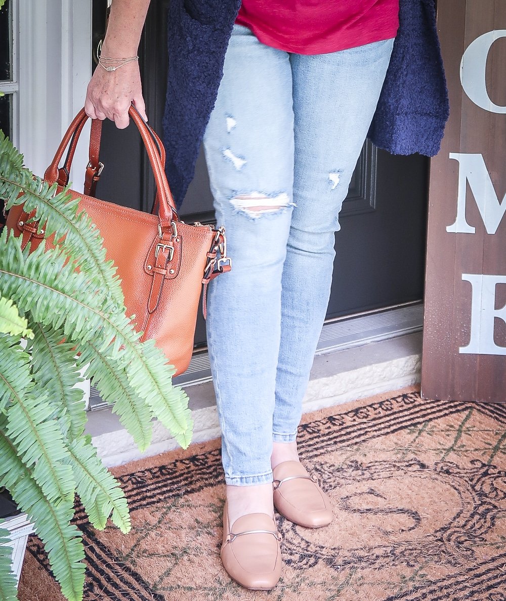 Fashion Blogger 50 Is Not Old is weekend ready in her distressed jeans