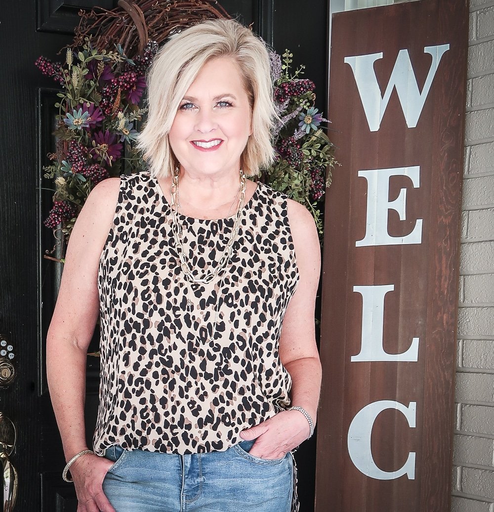 Fashion Blogger 50 Is Not Old is wearing a leopard print statement top
