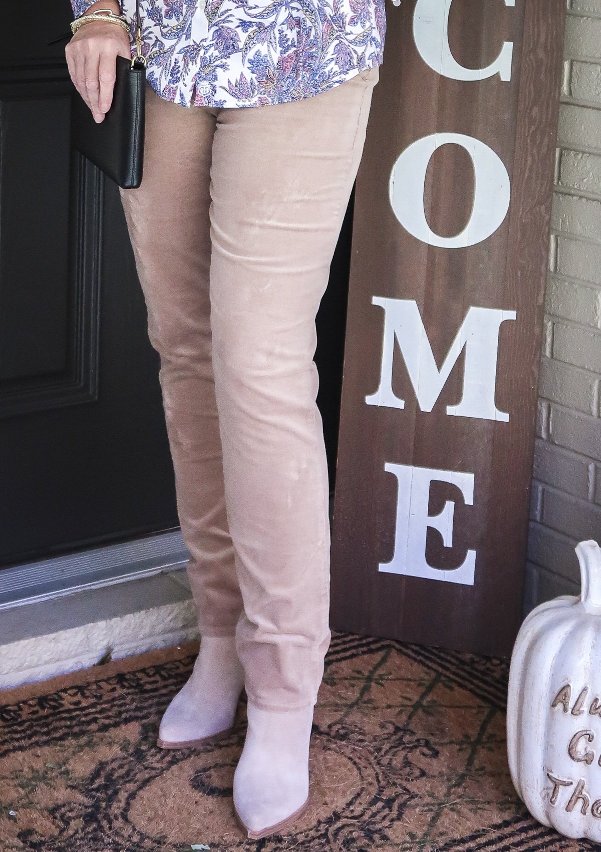 Fashion Blogger 50 Is Not Old is wearing camel corduroy pants and pointy toe ankle boots