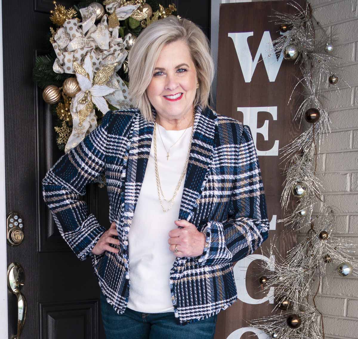 Fashion Blogger 50 Is Not Old is wearing a tweed blazer with a ecru colored sweater