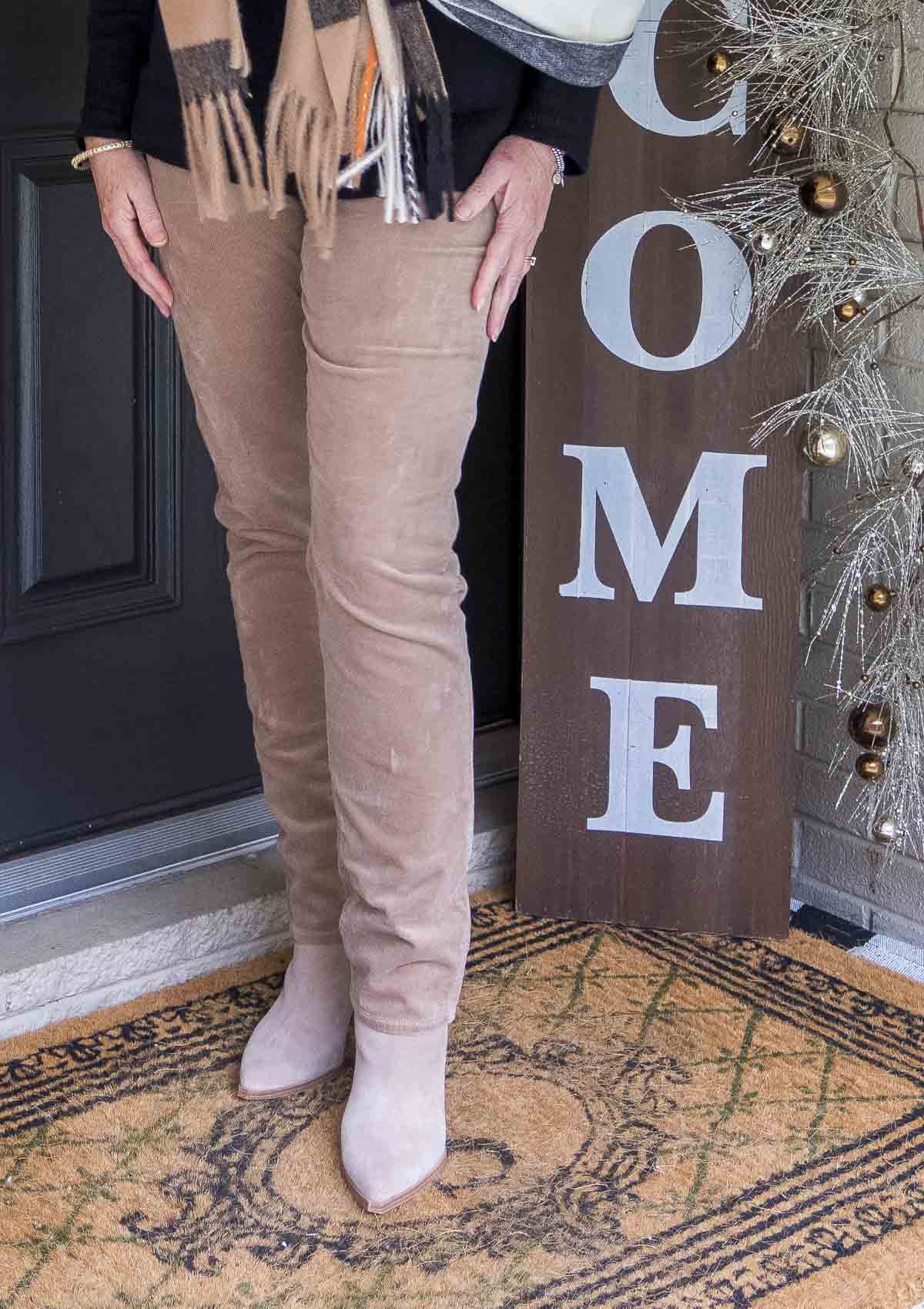 Fashion Blogger 50 Is Not Old is styling a pair of corduroy pants with pointy toe boots
