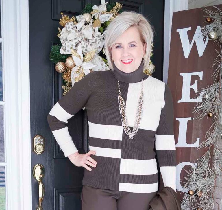 Fashion Blogger 50 Is Not Old is wearing a colorblocked turtleneck