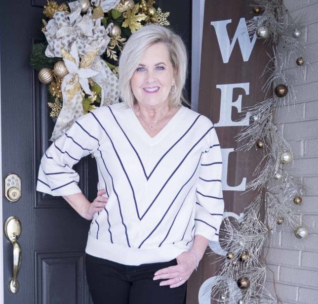 Fashion Blogger 50 Is Not Old is looking thin in this chevron striped sweater from Chico's 