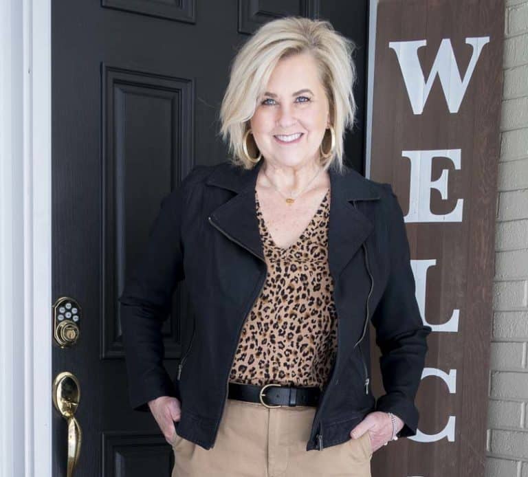 Fashion Blogger 50 Is Not Old is wearing a moto jacket and a leopard print tee
