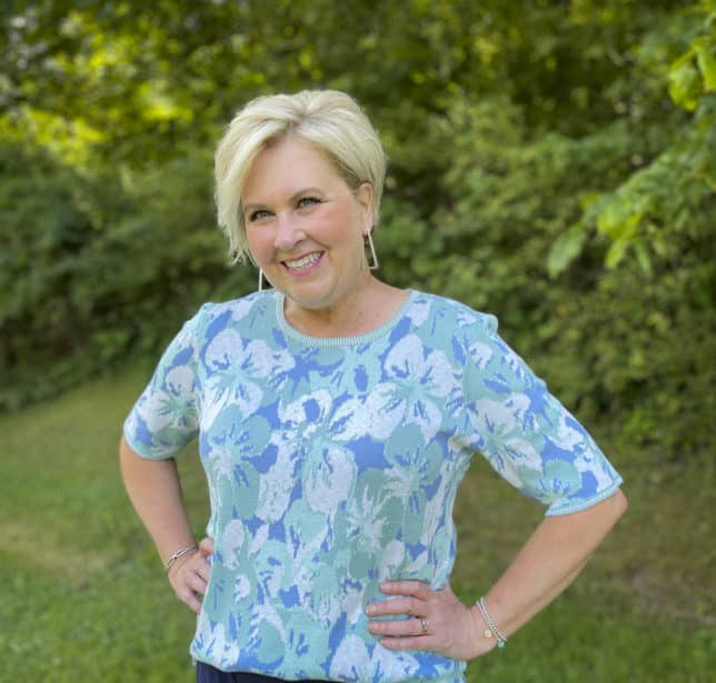 Fashion Blogger 50 Is Not Old is wearing a floral sweater with elbow length sleeves from Appleseeds