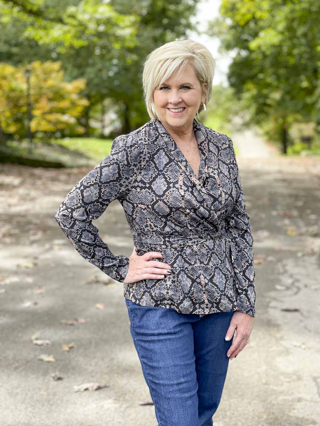 Over 40 Fashion Blogger, Tania Stephens, is showing her recent Walmart haul including this snake print wrap top