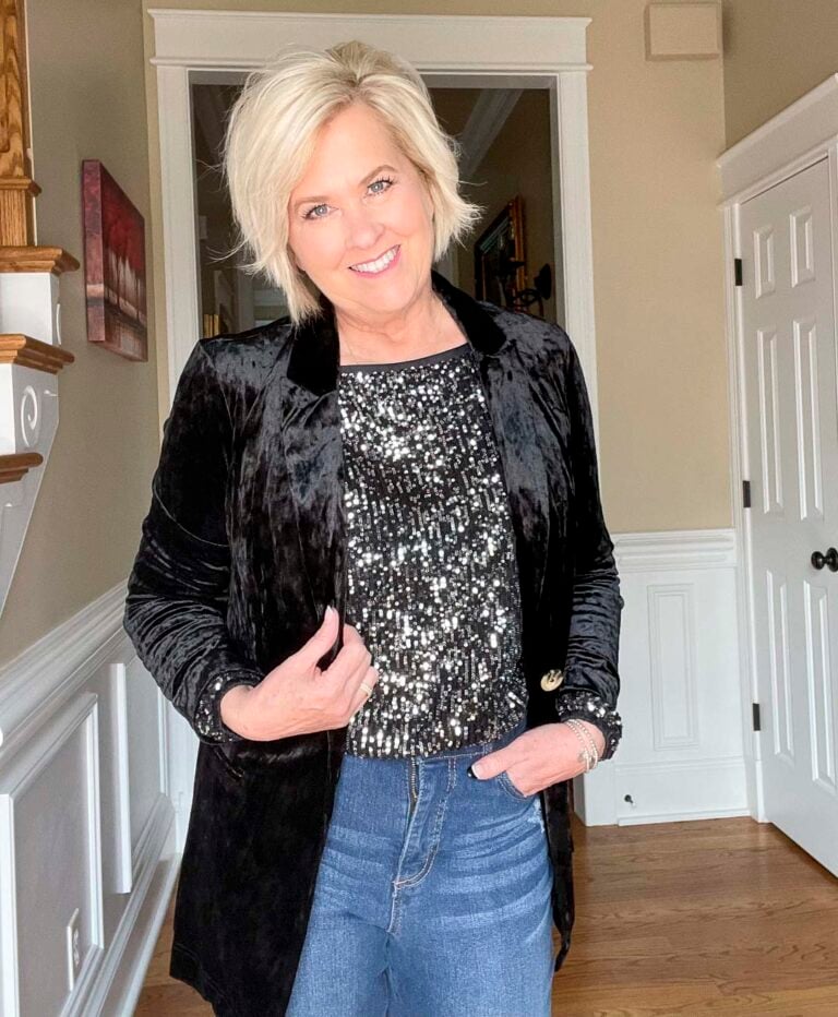 Over 40 Fashion Blogger, Tania Stephens is wearing a charcoal sequined top and a crushed velvet blazer