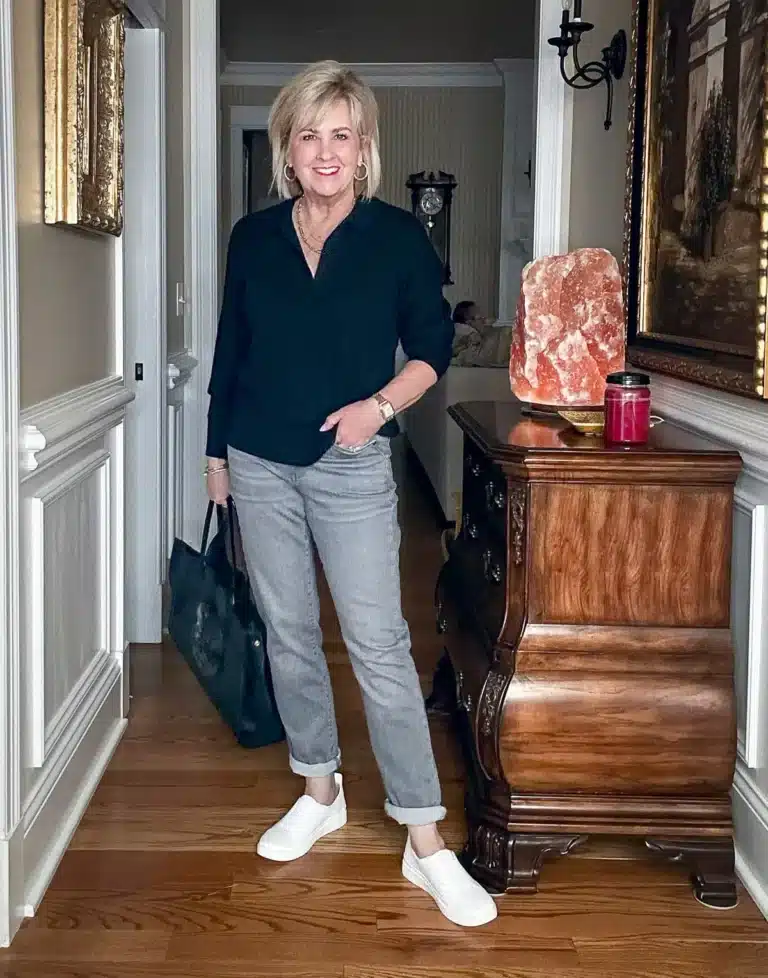 Over 50 Fashion Blogger, Tania Stephens is styling a pair of comfortable slip on shoes for standing all day long