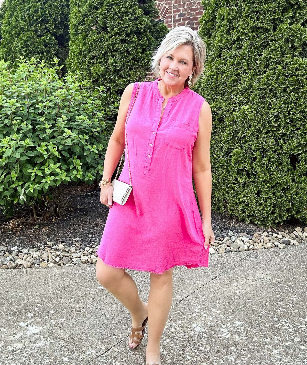 Over 50 Fashion Blogger, Tania Stephens is showing how to beat the summer heatwave In a pink gauze dress 9