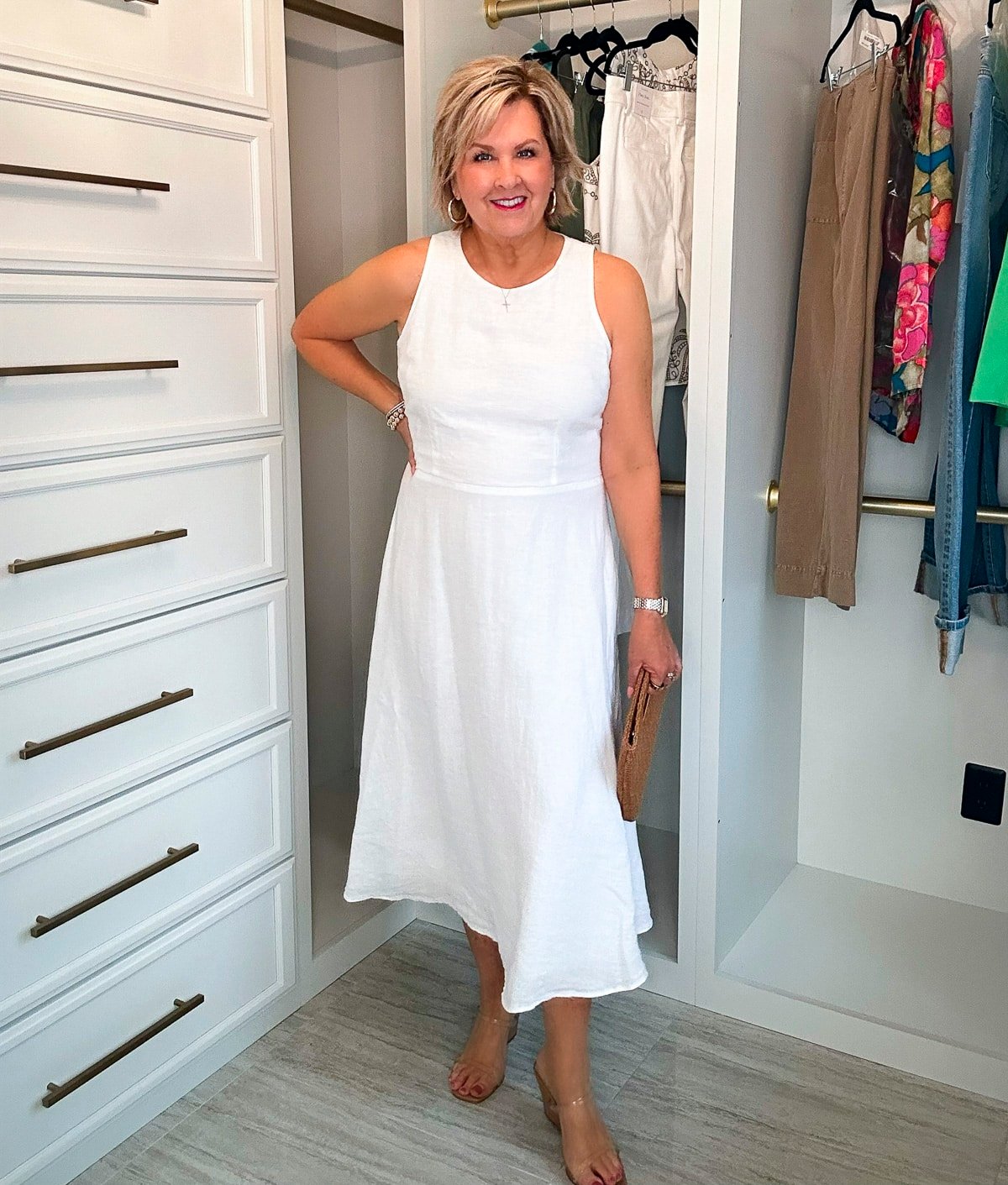 Over 50 Fashion Blogger, Tania Stephens is showing how to beat the summer heatwave In a white linen dress20
