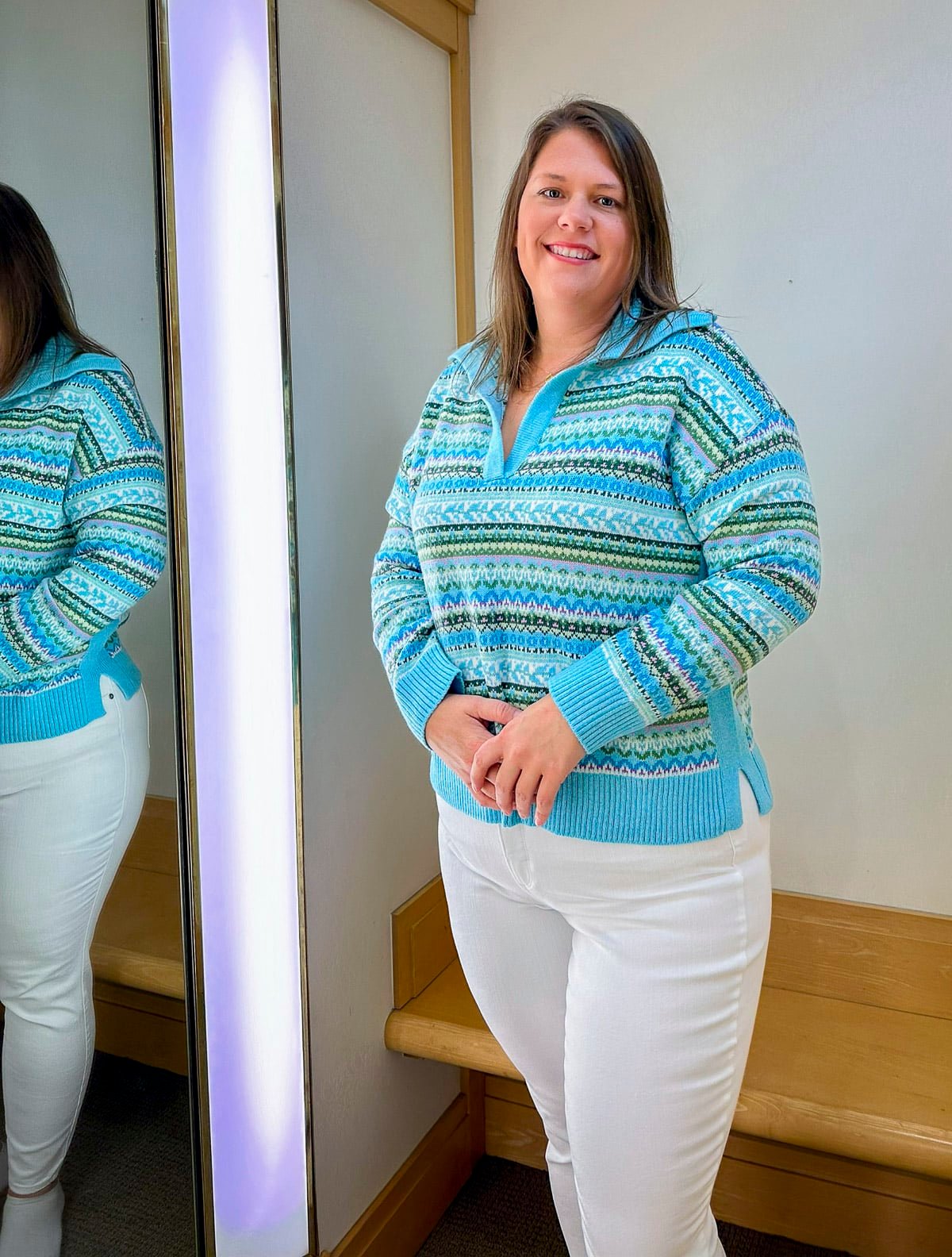 Megan is trying on a Talbots a striped sweater and white jeggings