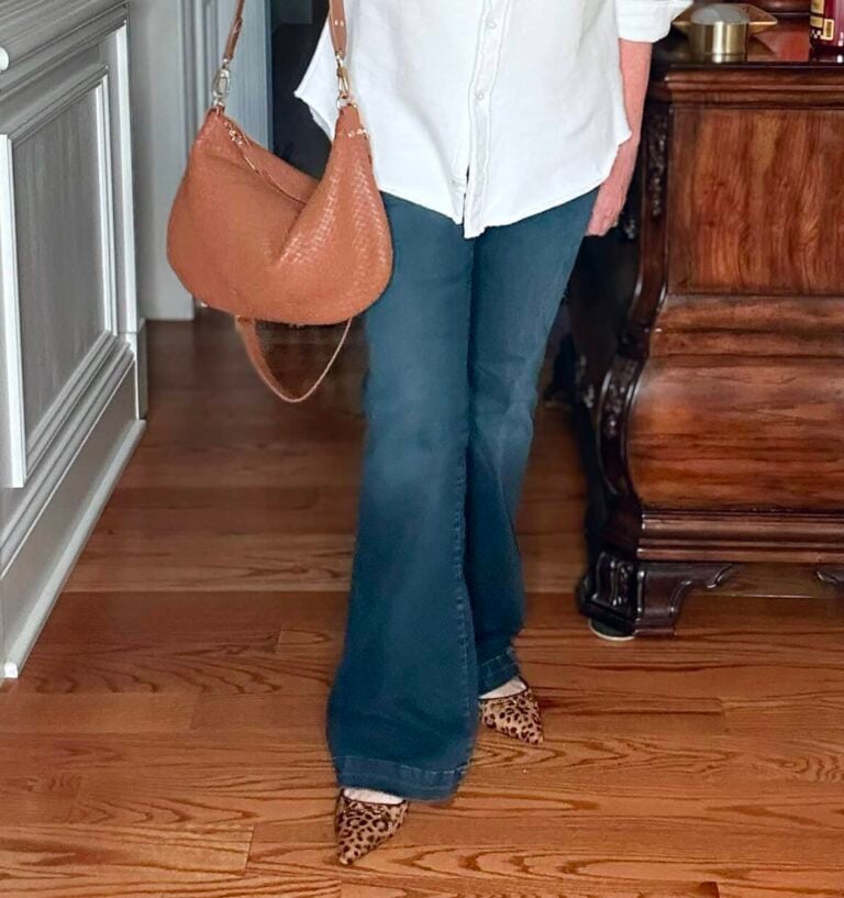 Tania Stephens is wearing Good American Flare jeans