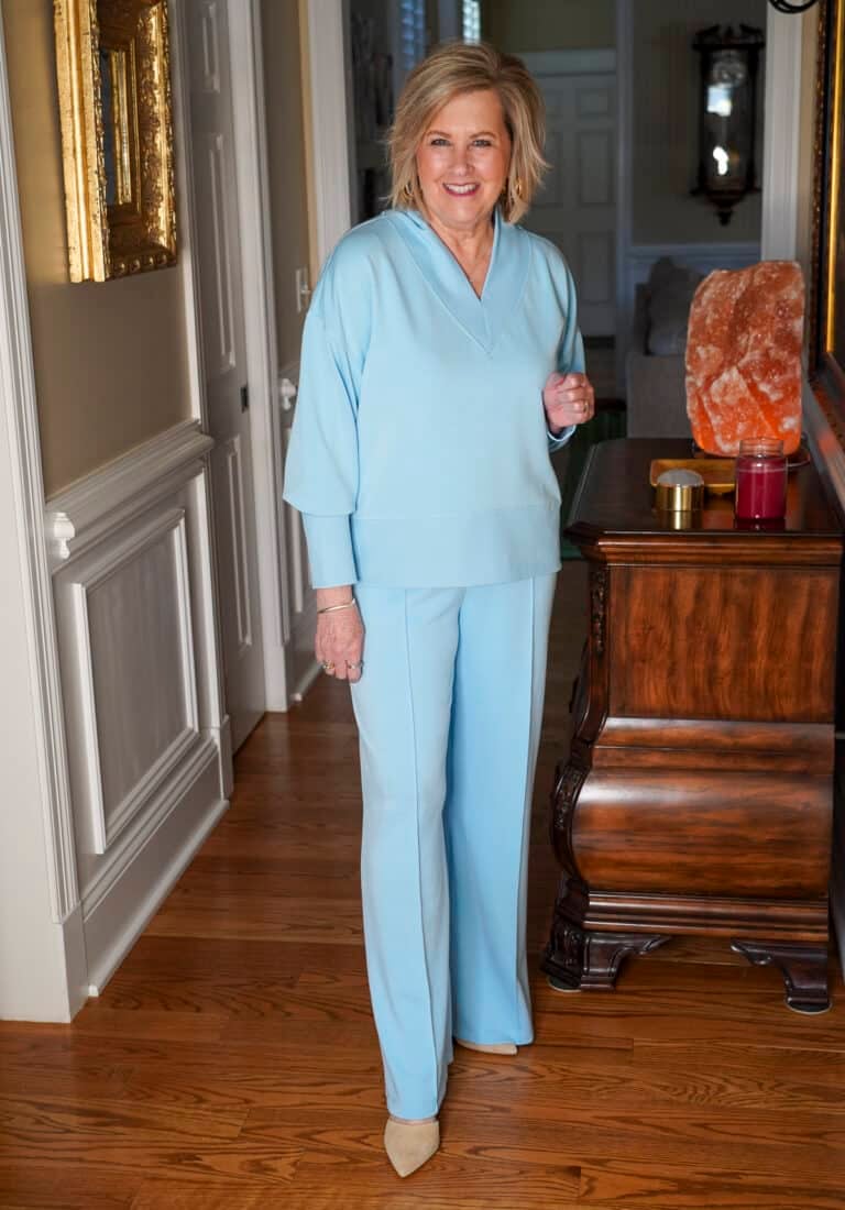 Tania Stephens is wearing a powder blue scuba knit top and bottom from Walmart