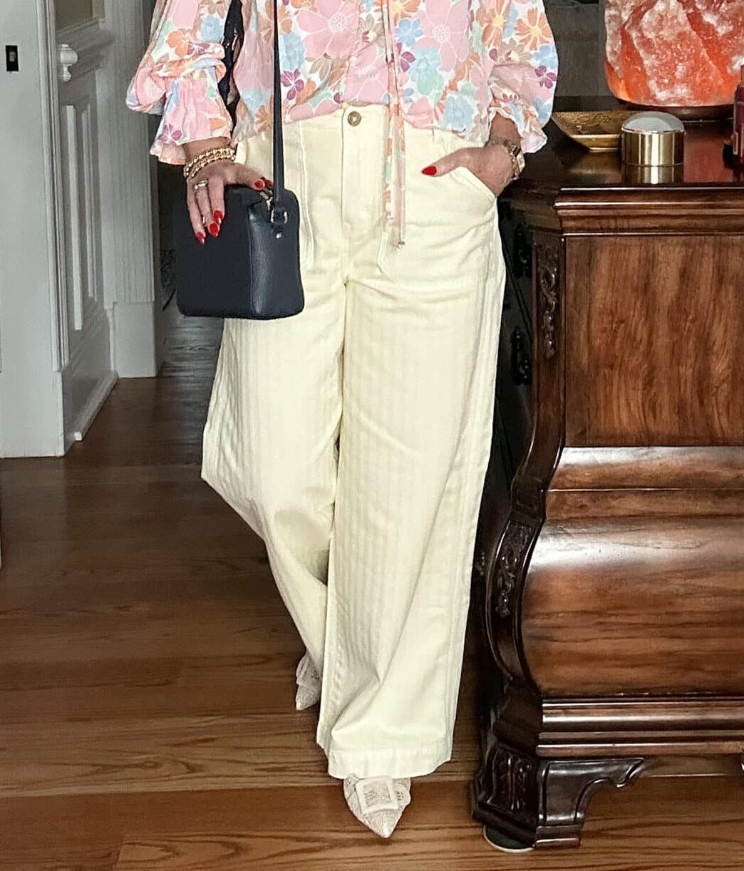 Over 50 Fashion Blogger, Tania Stephens is styling Old Navy clothing -  butter yellow wide leg pants
