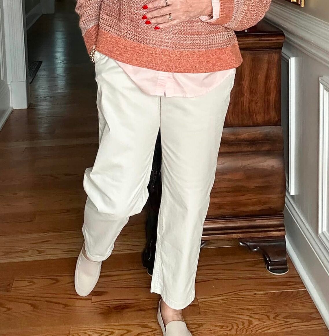 Over 50 Fashion Blogger, Tania Stephens is styling Old Navy clothing -  chinos and beige loafers