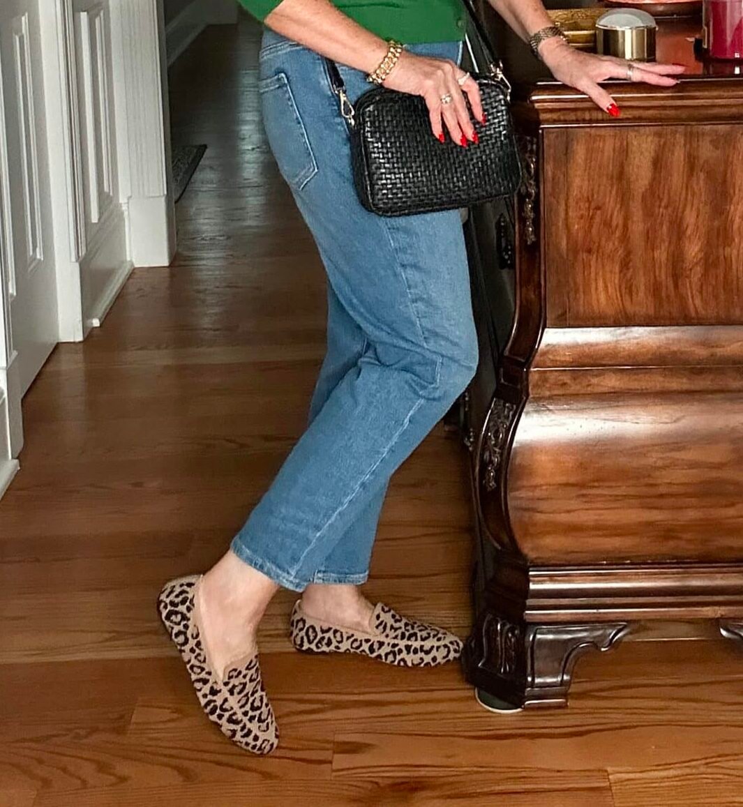 Over 50 Fashion Blogger, Tania Stephens is styling Old Navy clothing -  straight leg jeans and leopard print loafers