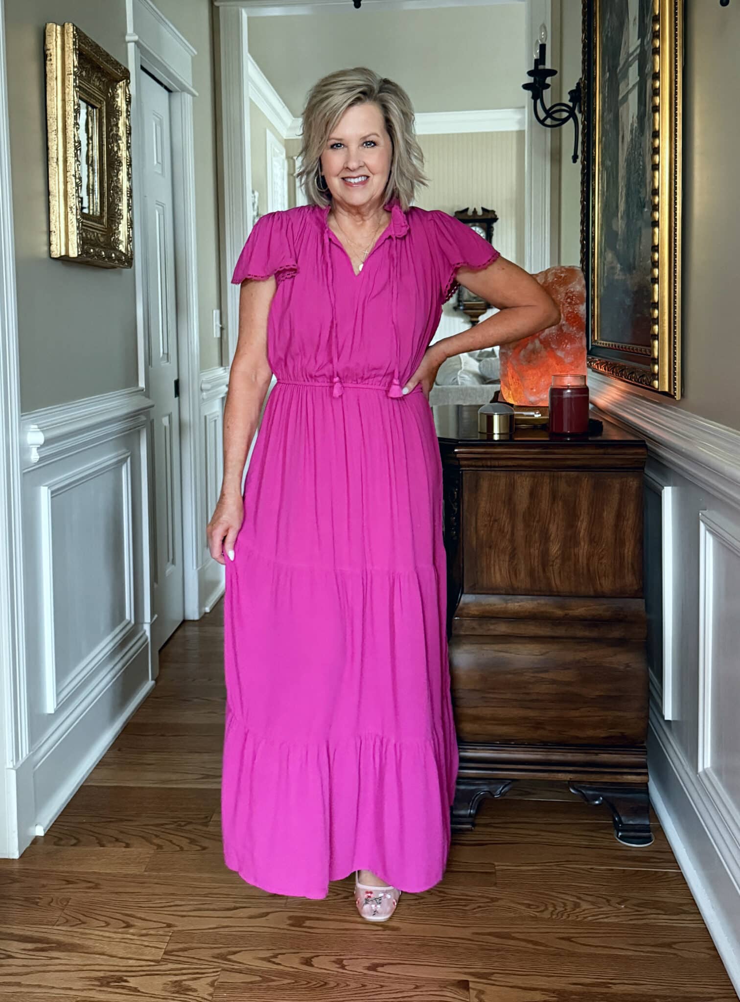 Tania Stephens is wearing fuchsia maxi dress from Walmart