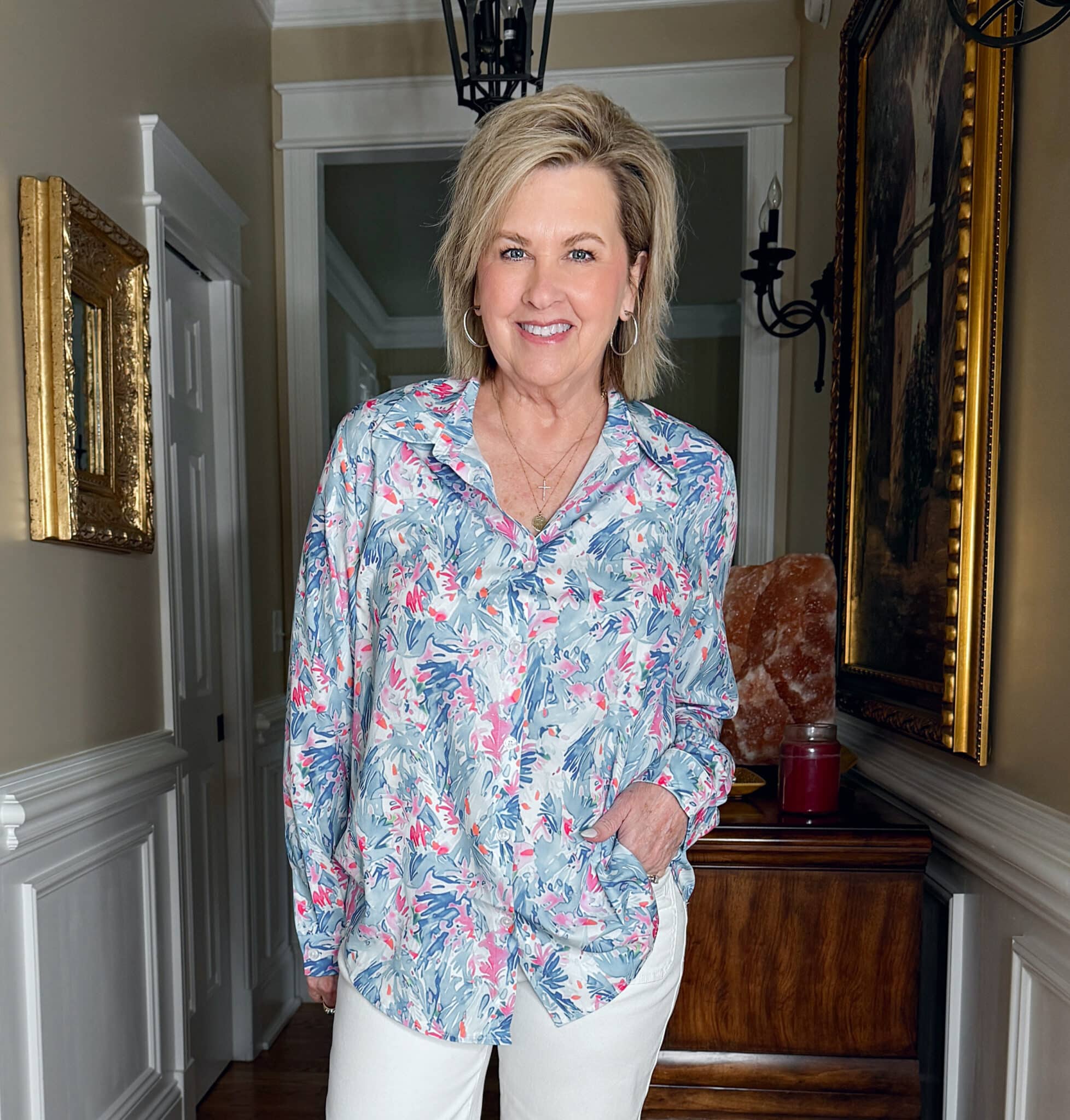 Tania Stephens is wearing a blue print button up shirt from Amazon