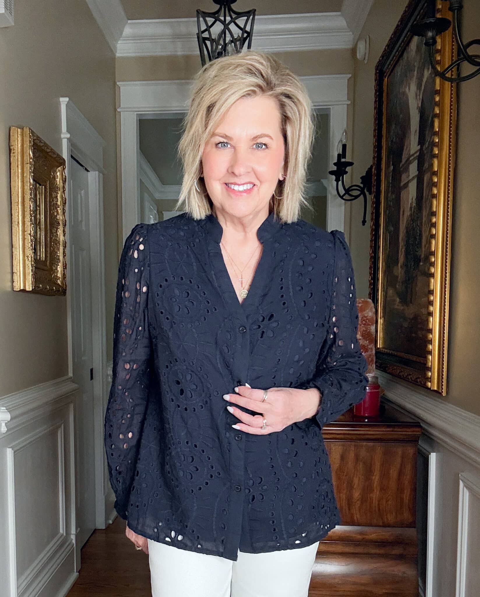 Tania Stephens is wearing a navy lace shirt from Amazon
