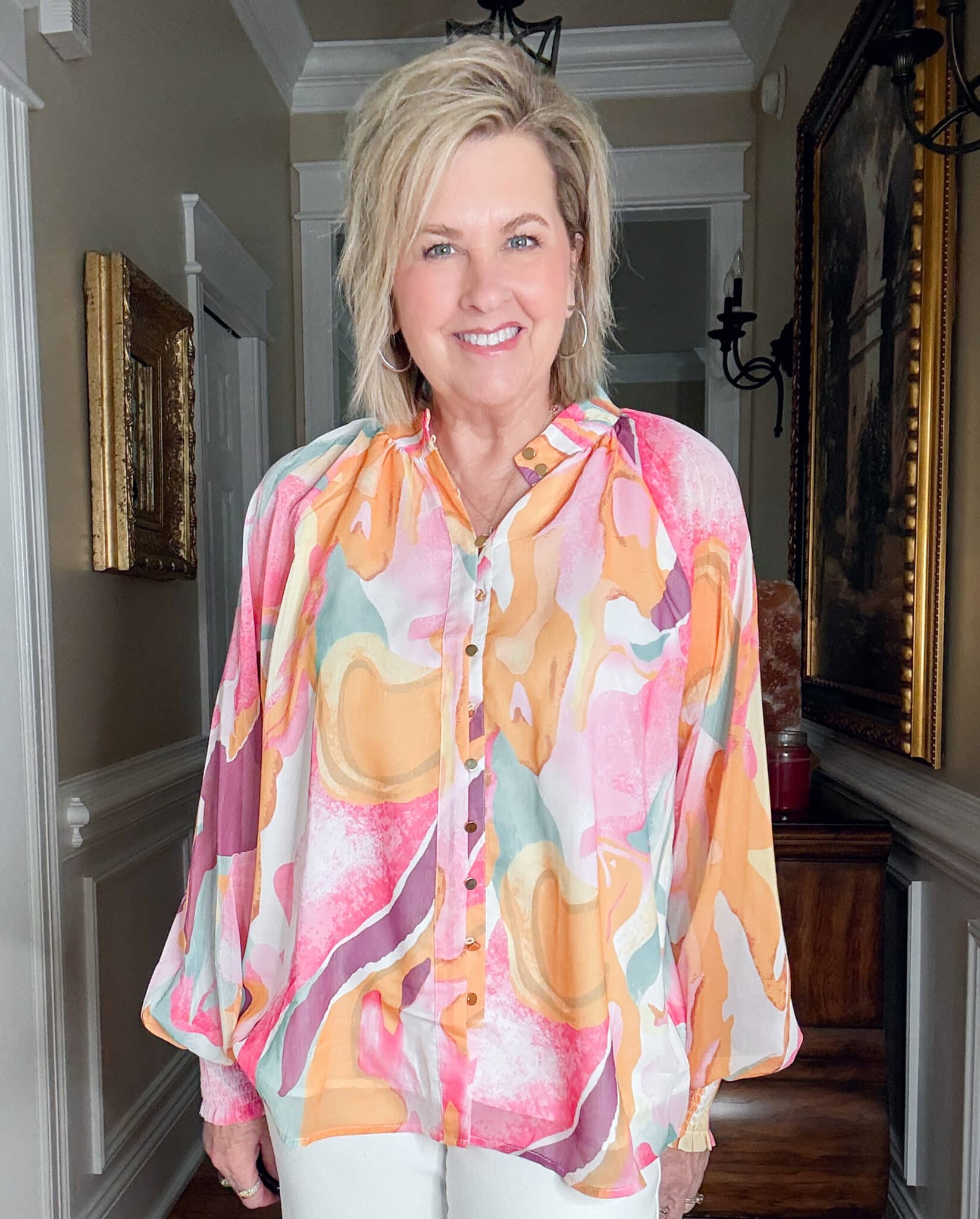 Tania Stephens is wearing a lantern sleeve watercolor shirt from Amazon
