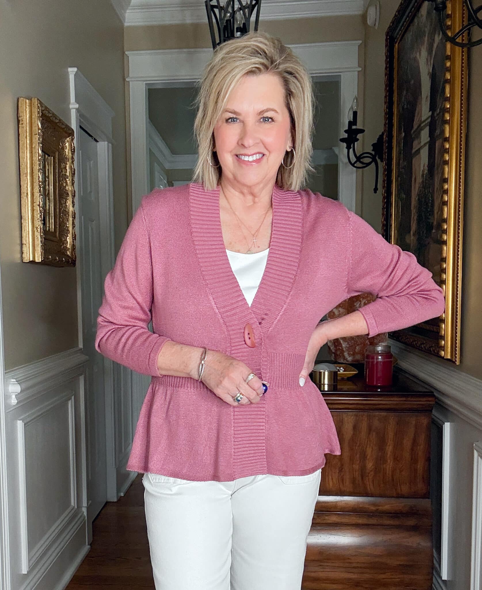 Tania Stephens is wearing a dusty rose cardigan from Amazon