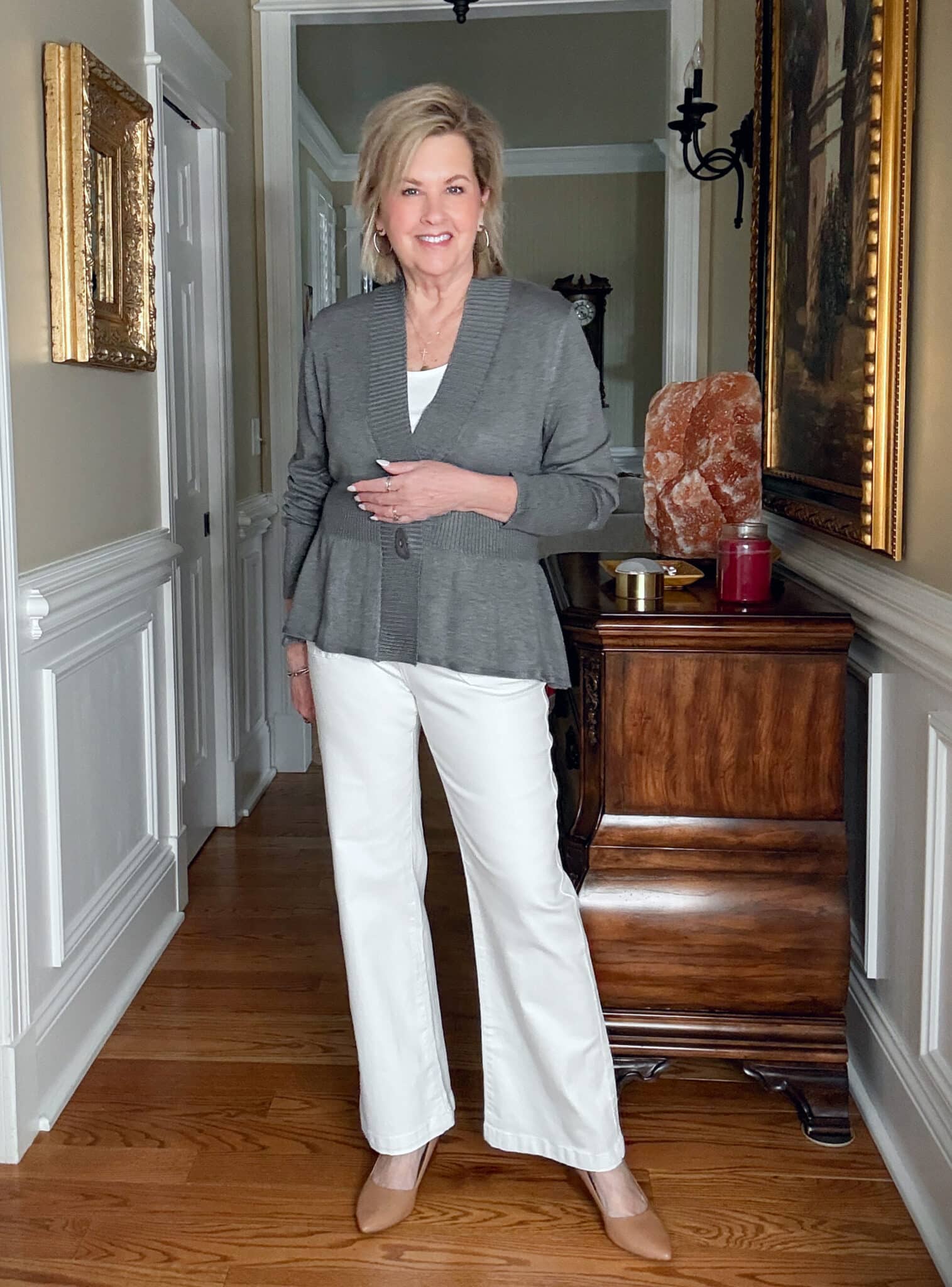 Tania Stephens is wearing a dark gray cardigan from Amazon