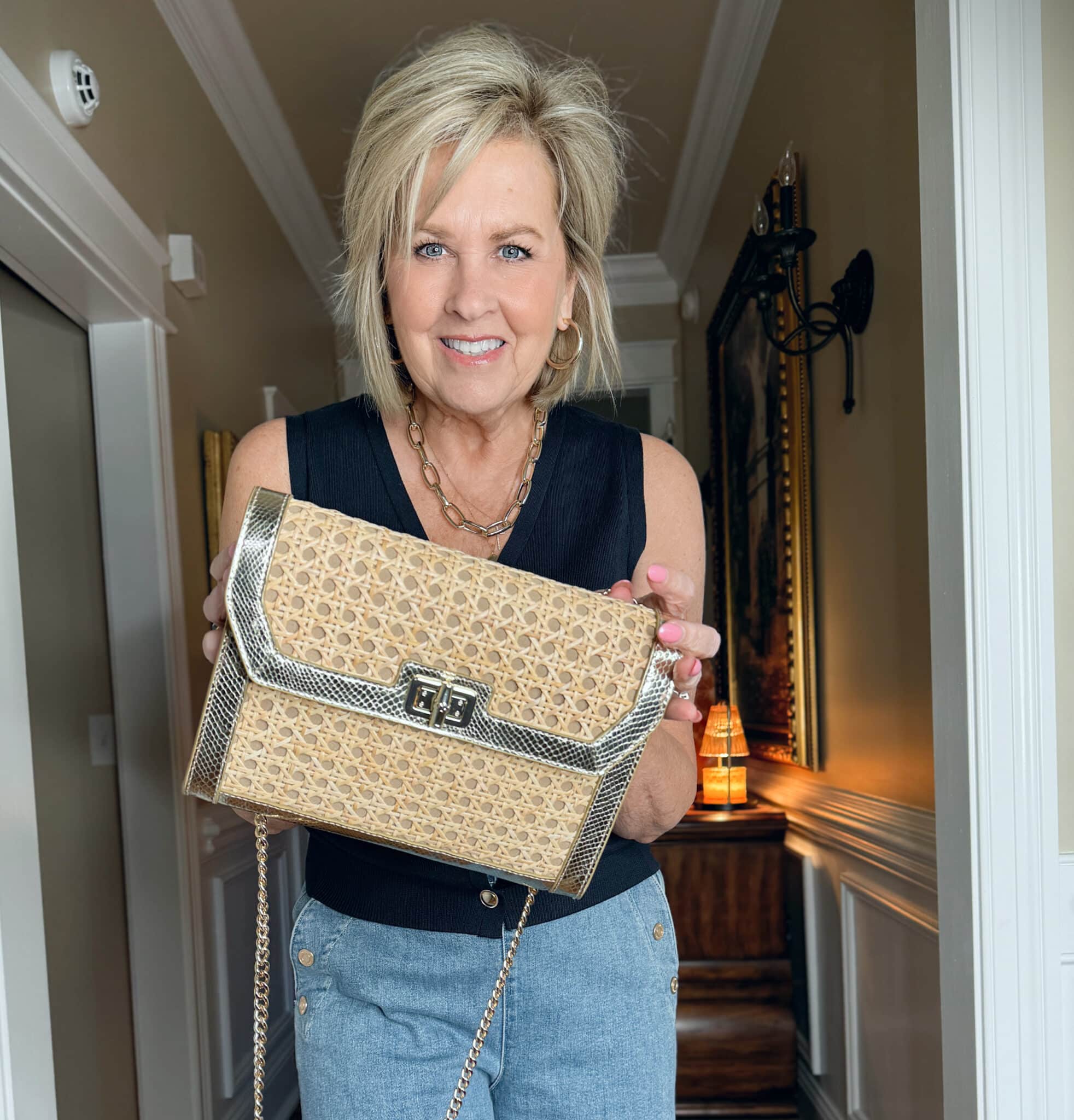 Tania Stephens is wearing a straw handbag