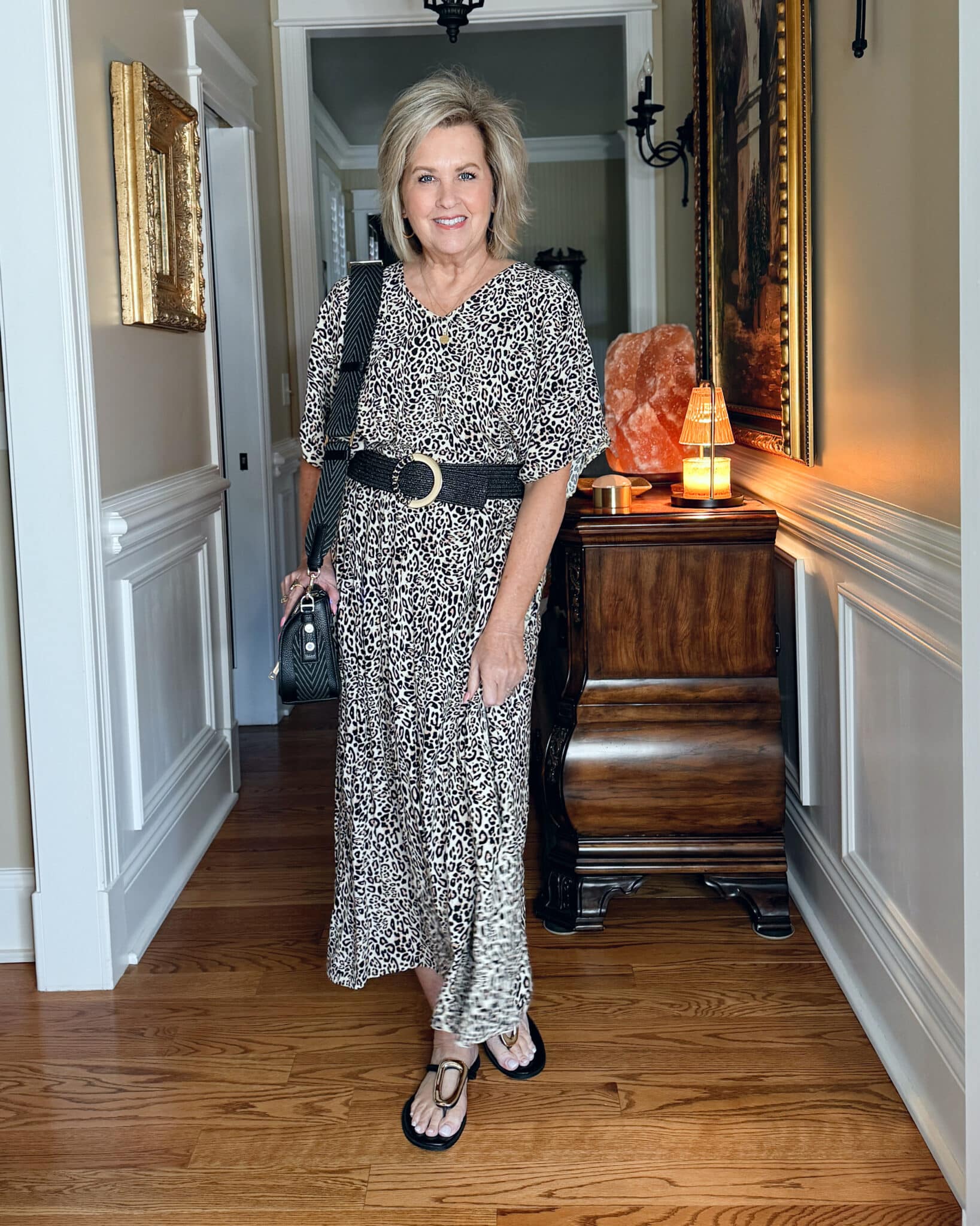 Tania Stephens wearing a belted leopard print caftan dress from Amazon