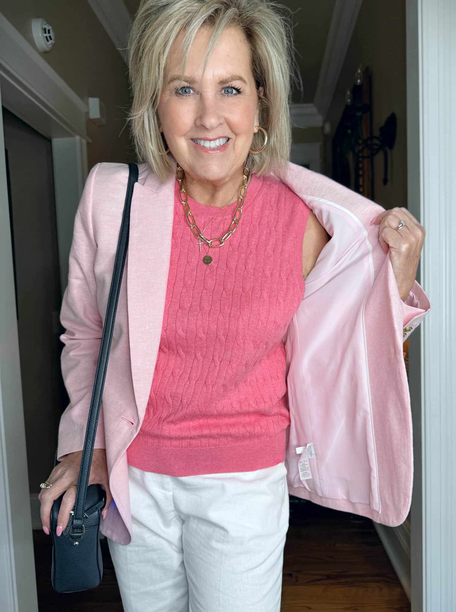 Tania Stephens is wearing a medium pink shell from J.Crew Factory