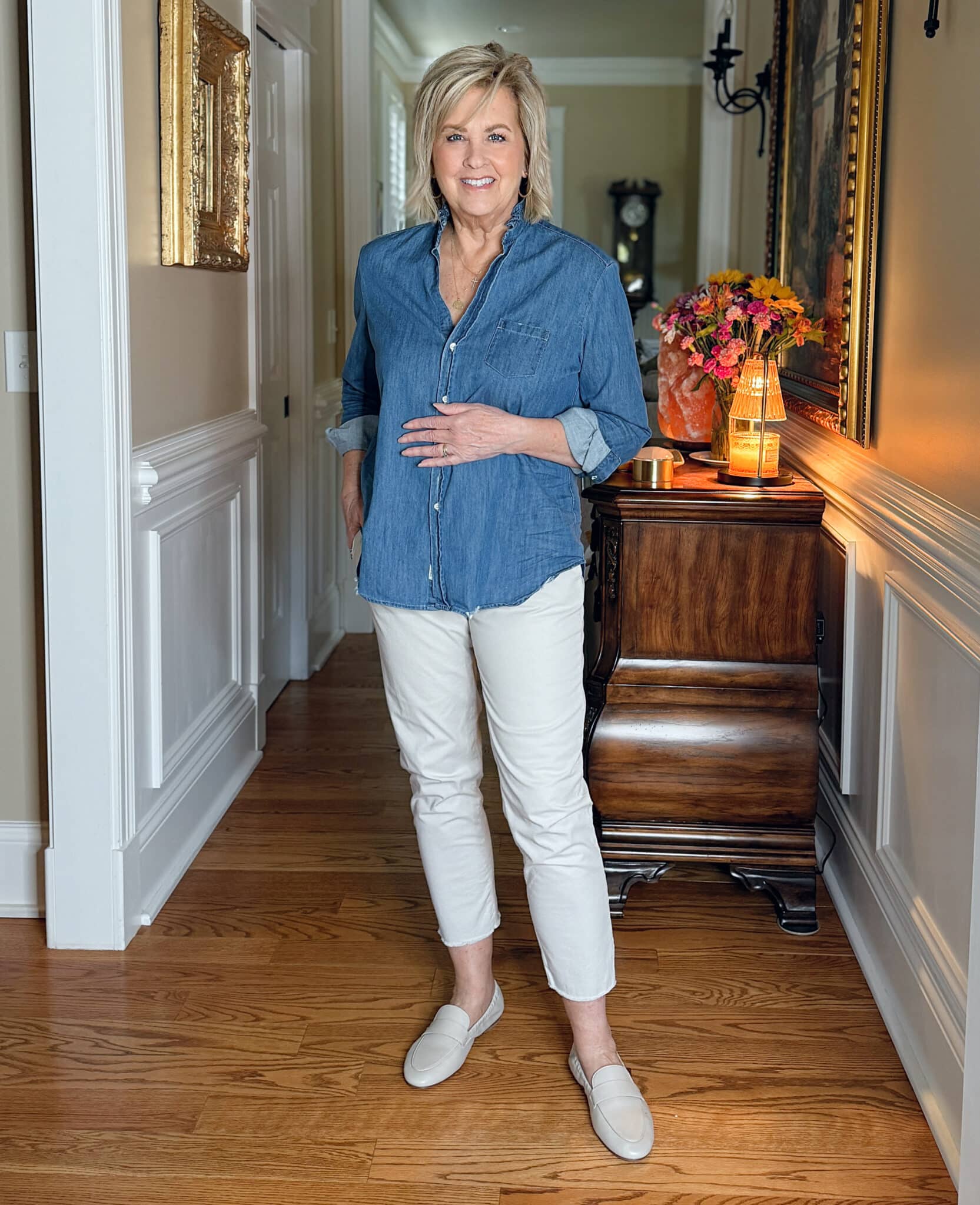 Tania Stephens wearing Frank & Eileen denim button up shirt with ruffle collar and straight leg ankle pants
