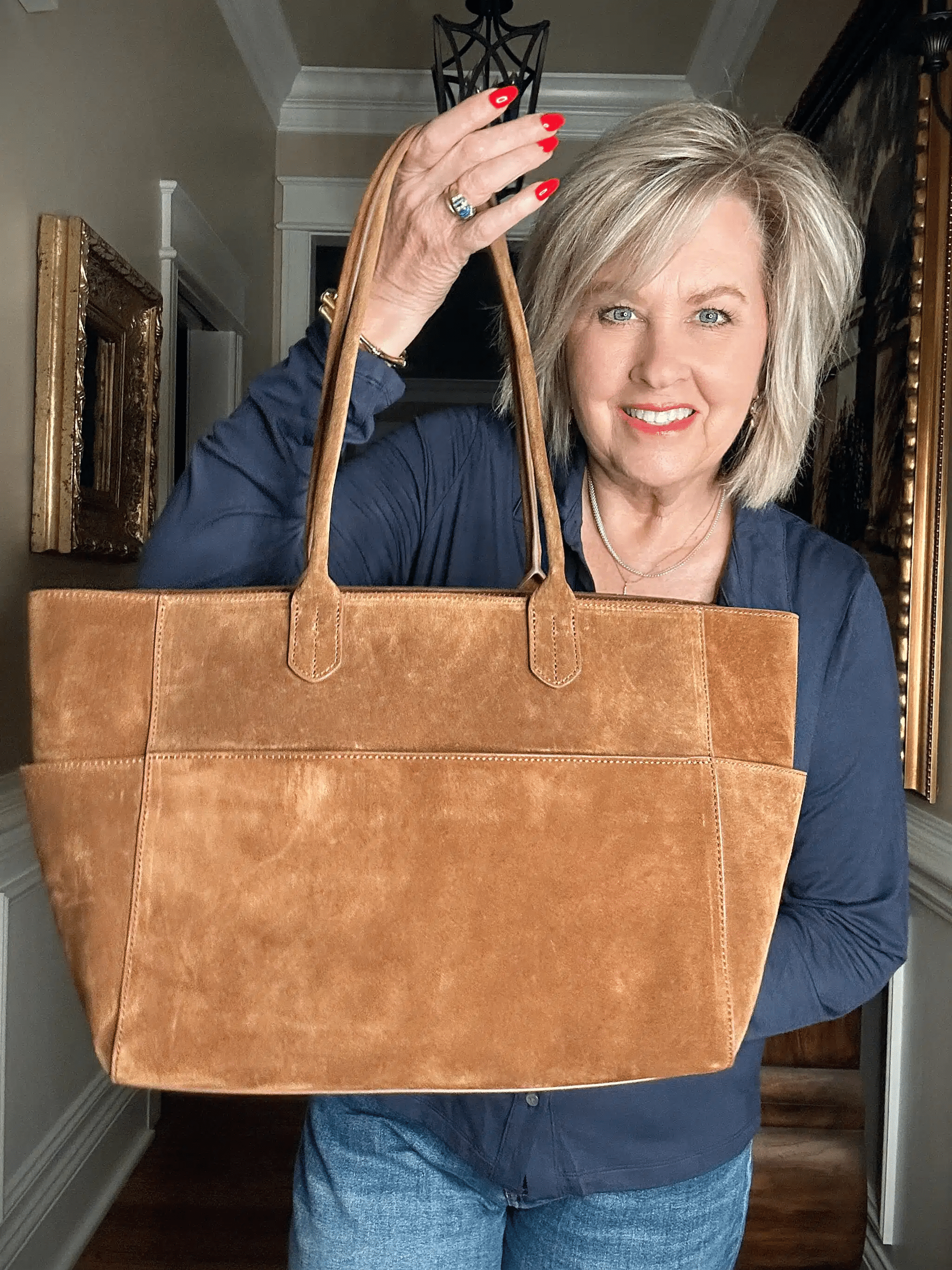 Large suede shopper tote from Quince in camel, shown with laptop and everyday essentials