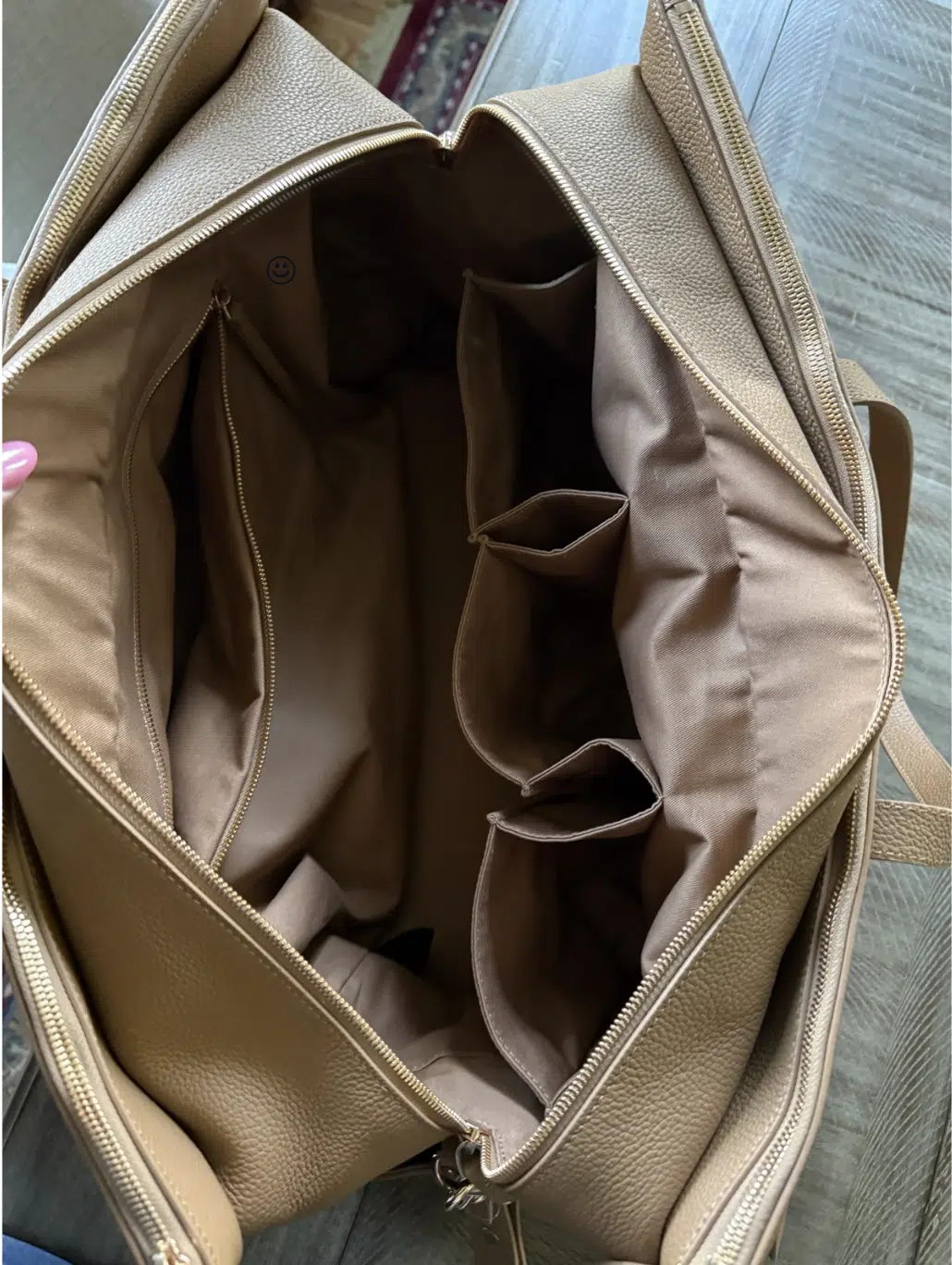 Inside of Quince weekender pockets I own