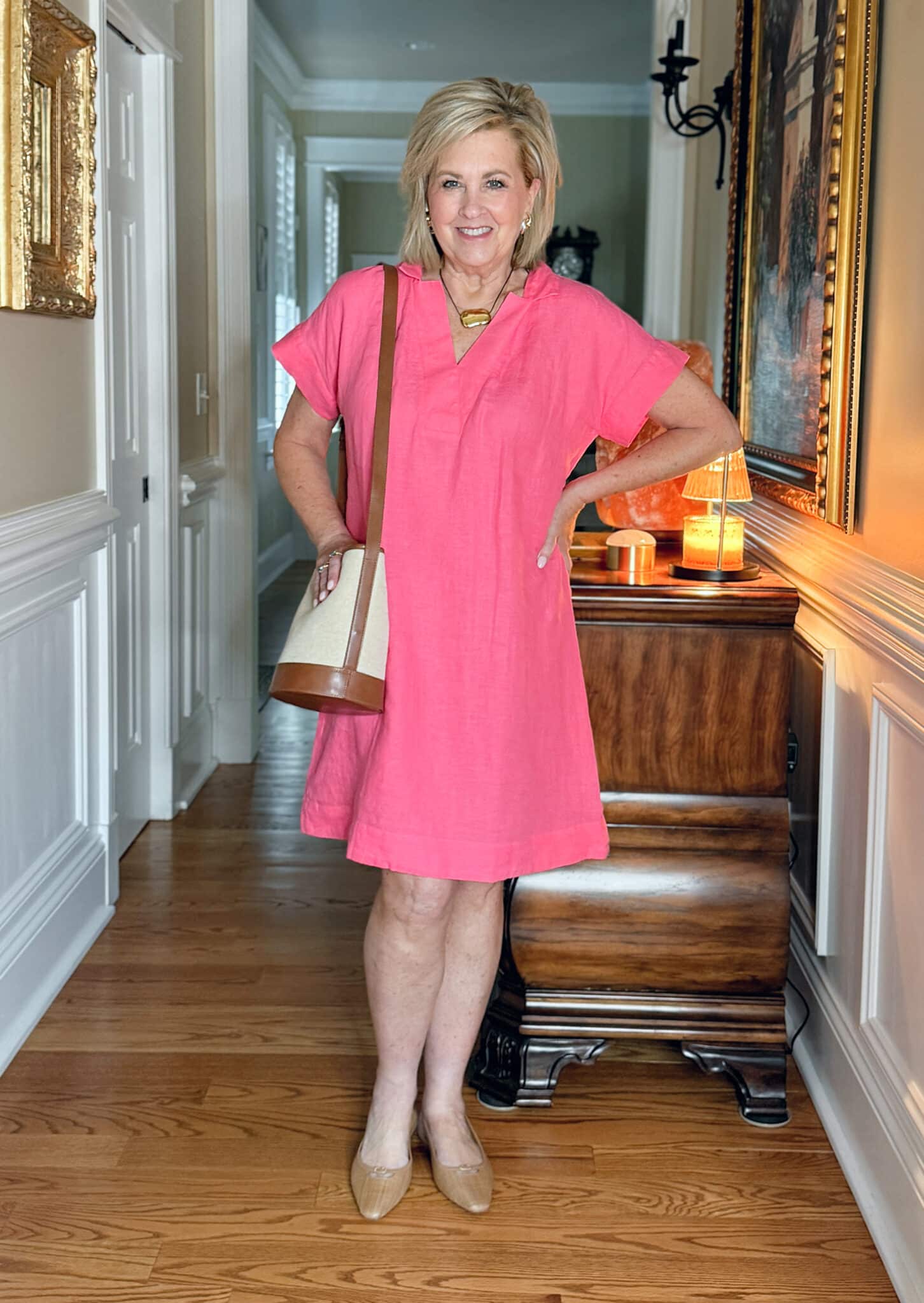 woman wearing a pink linen dress which would be great for church