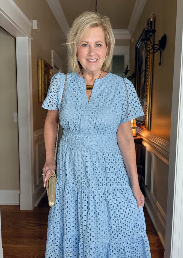 Tania Stephens wearing a light blue eyelet dress perfect for church