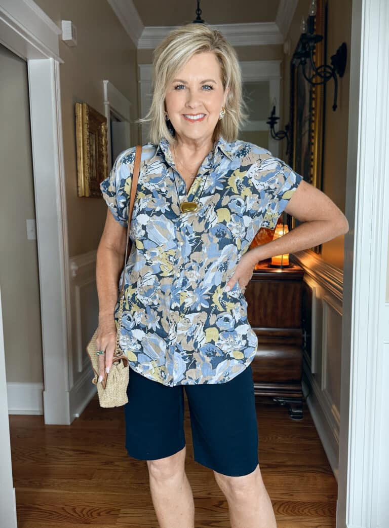 woman wearing a printed button shirt