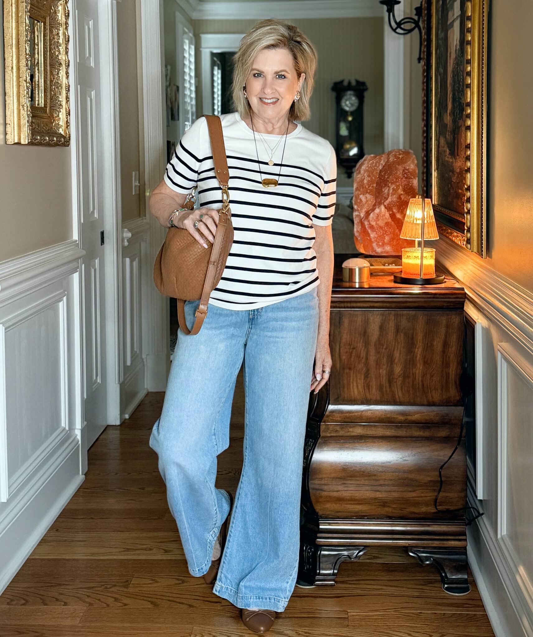 woman wearing a striped top and lightweight jeans for summer