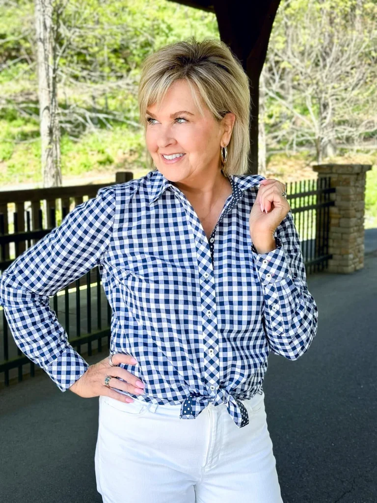 Tania Stephens wearing a navy and white gingham top