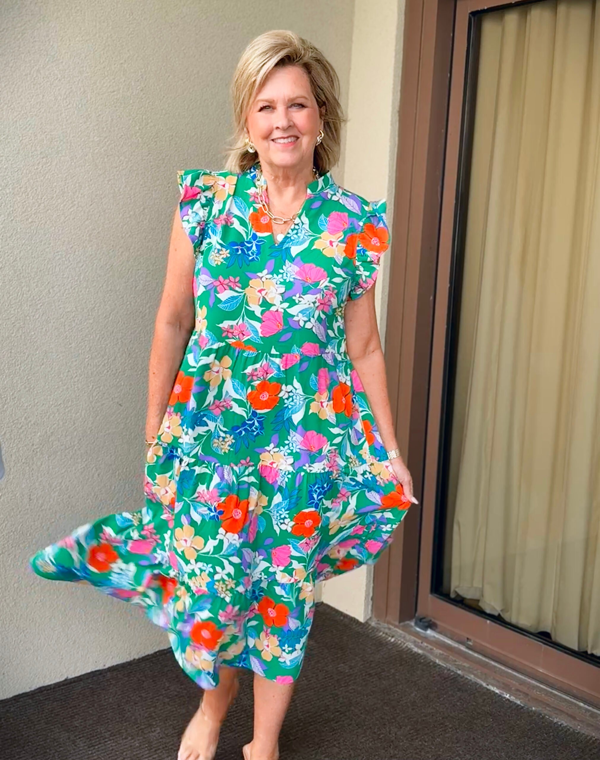 woman over 50 wearing a colorful dress from Amazon for summer