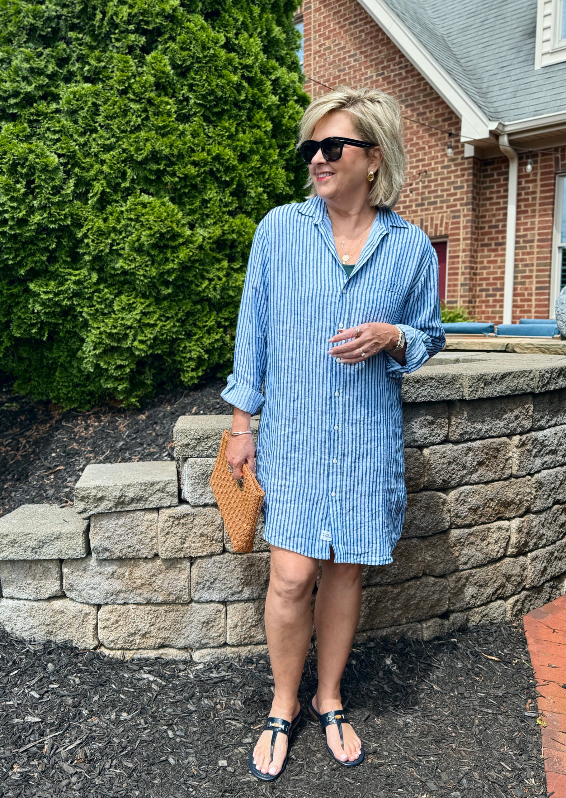 WOMAN WEARING STRIPED DRESS, COASTAL GRANDMOTHER STYLE FOR SUMMER 2025