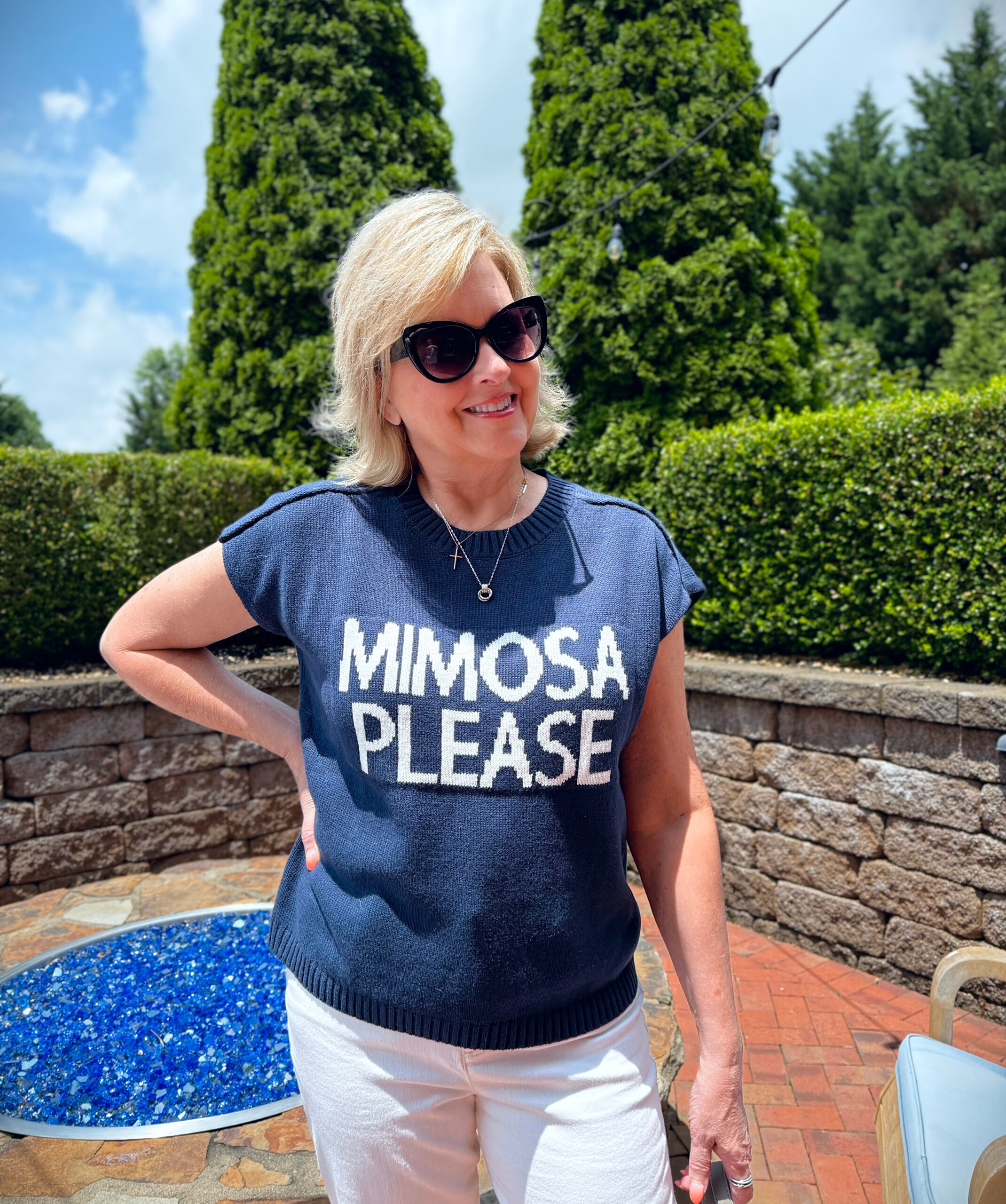 Tania wearing a navy and white Mimosa Please sweater from Nordstrom Rack