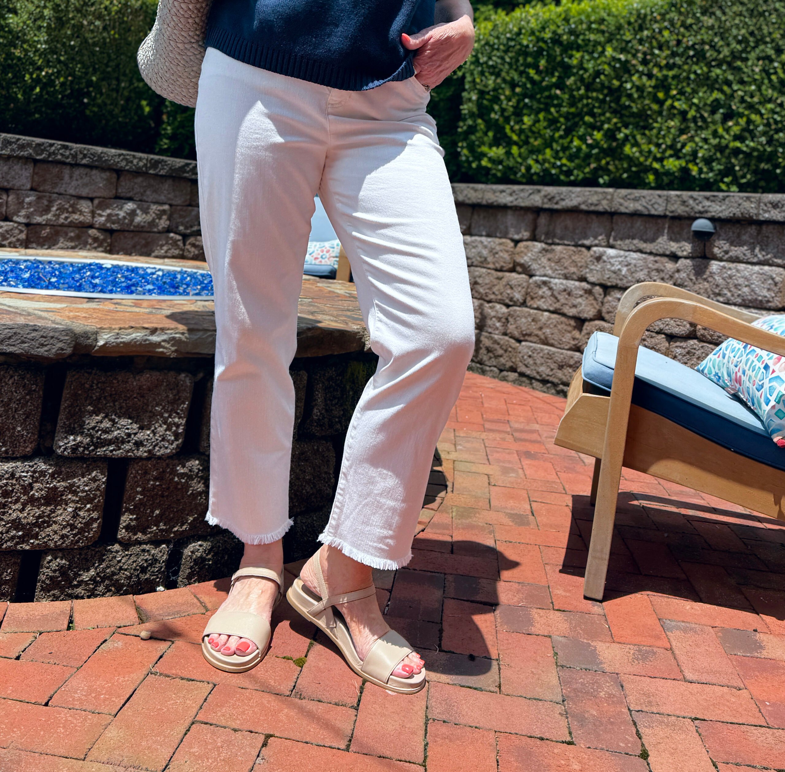 Tania wearing white frayed jeans outfit from Nordstrom Rack