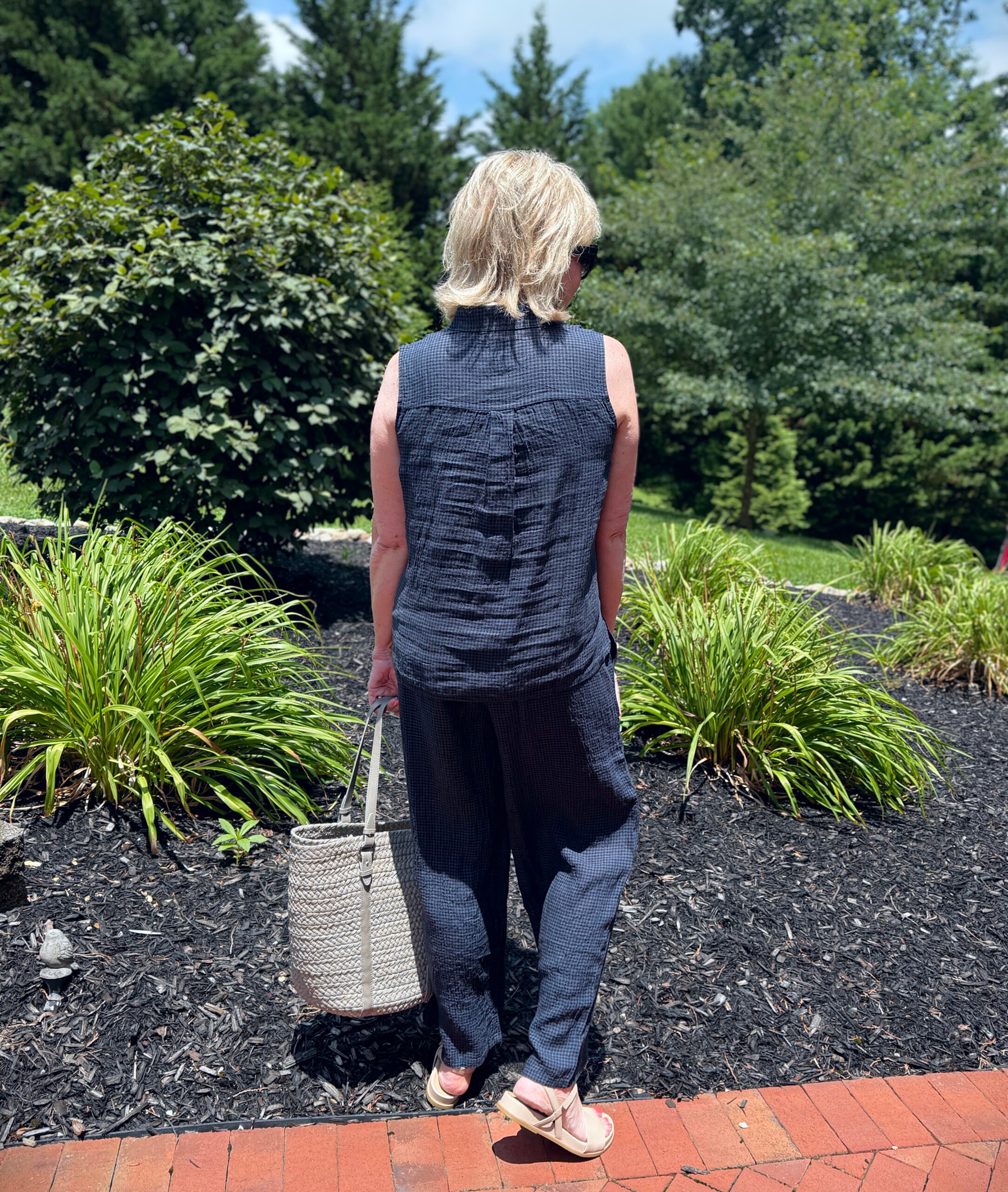 Tania wearing an Eileen Fisher navy checked outfit